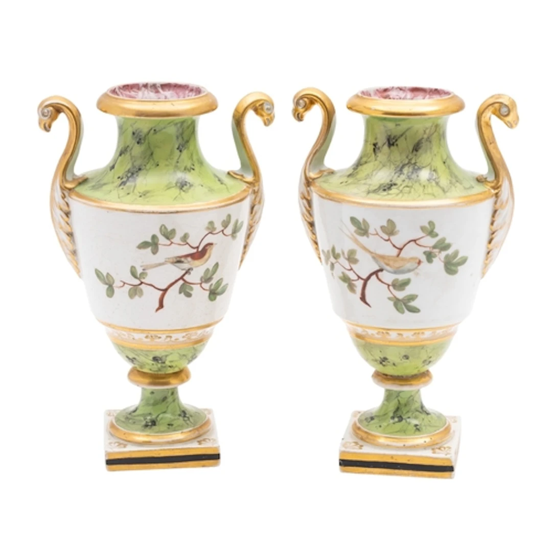 A pair of early 19th century Coalport urn-shaped vases, with...