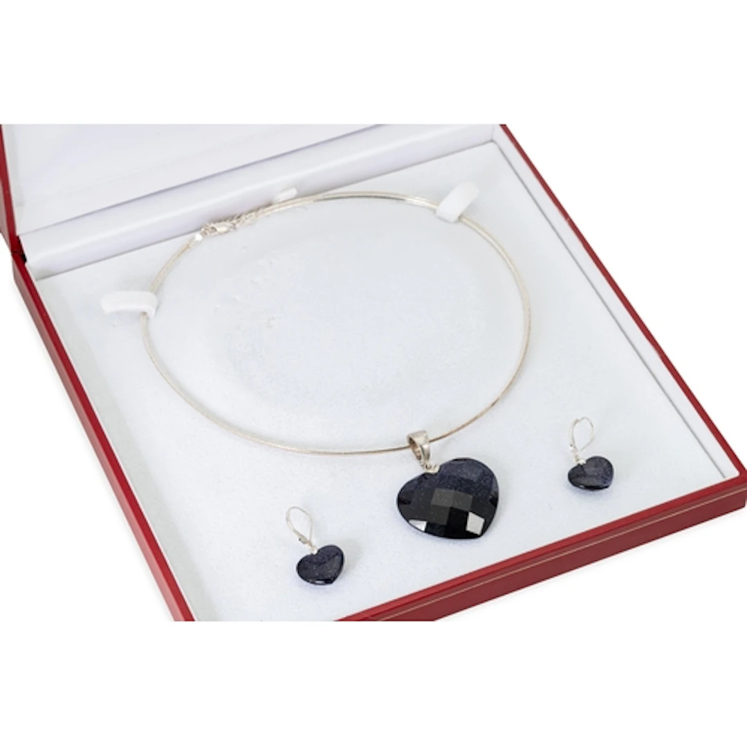 A SILVER PENDANT, with matching earrings with a stone-set he...