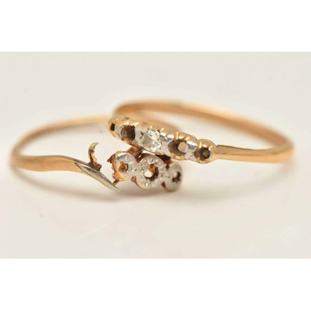 TWO YELLOW METAL RINGS, both AF broken, damaged, missing sto...