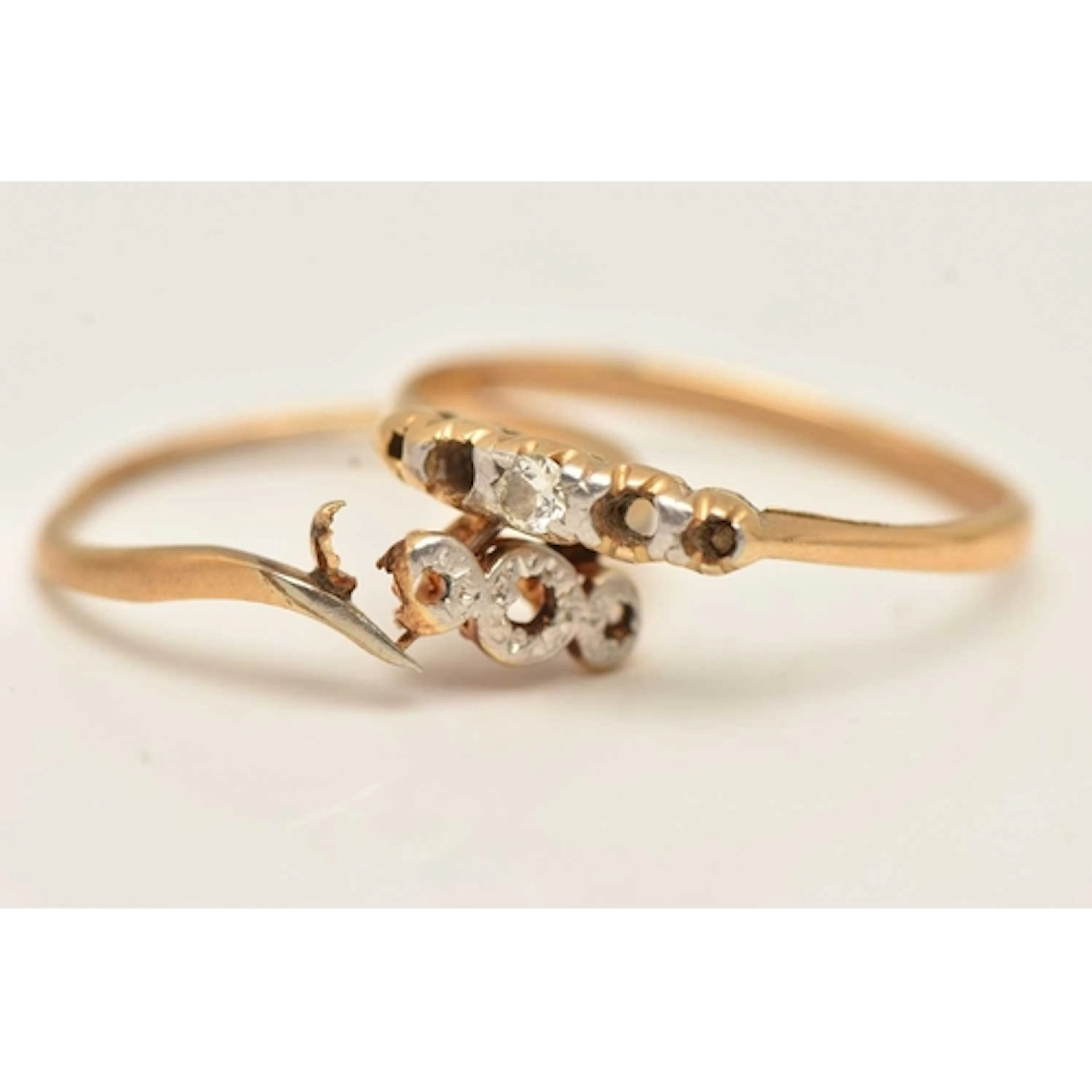 TWO YELLOW METAL RINGS, both AF broken, damaged, missing sto...