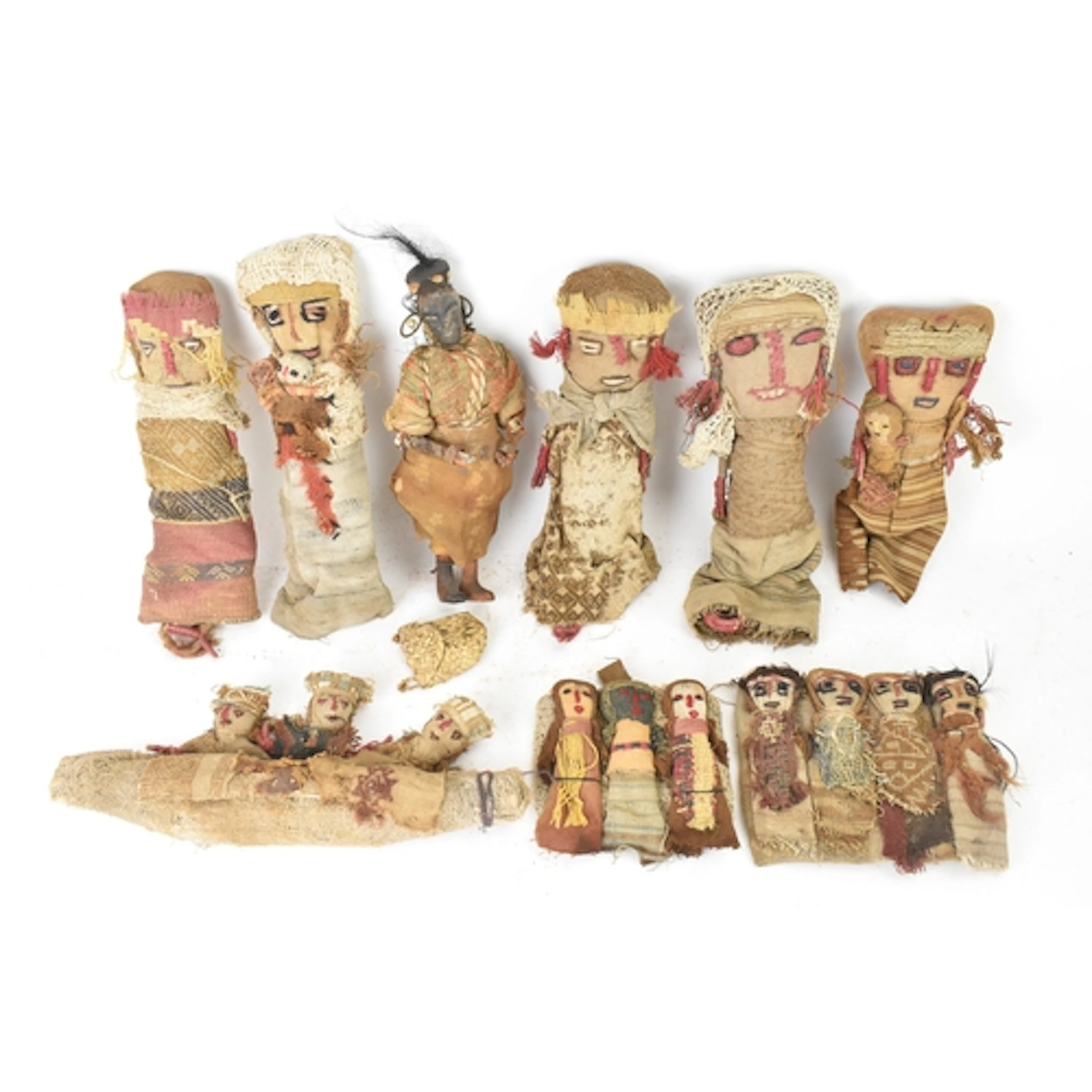 A collection of Chancay textile dolls and figures, possibly ...