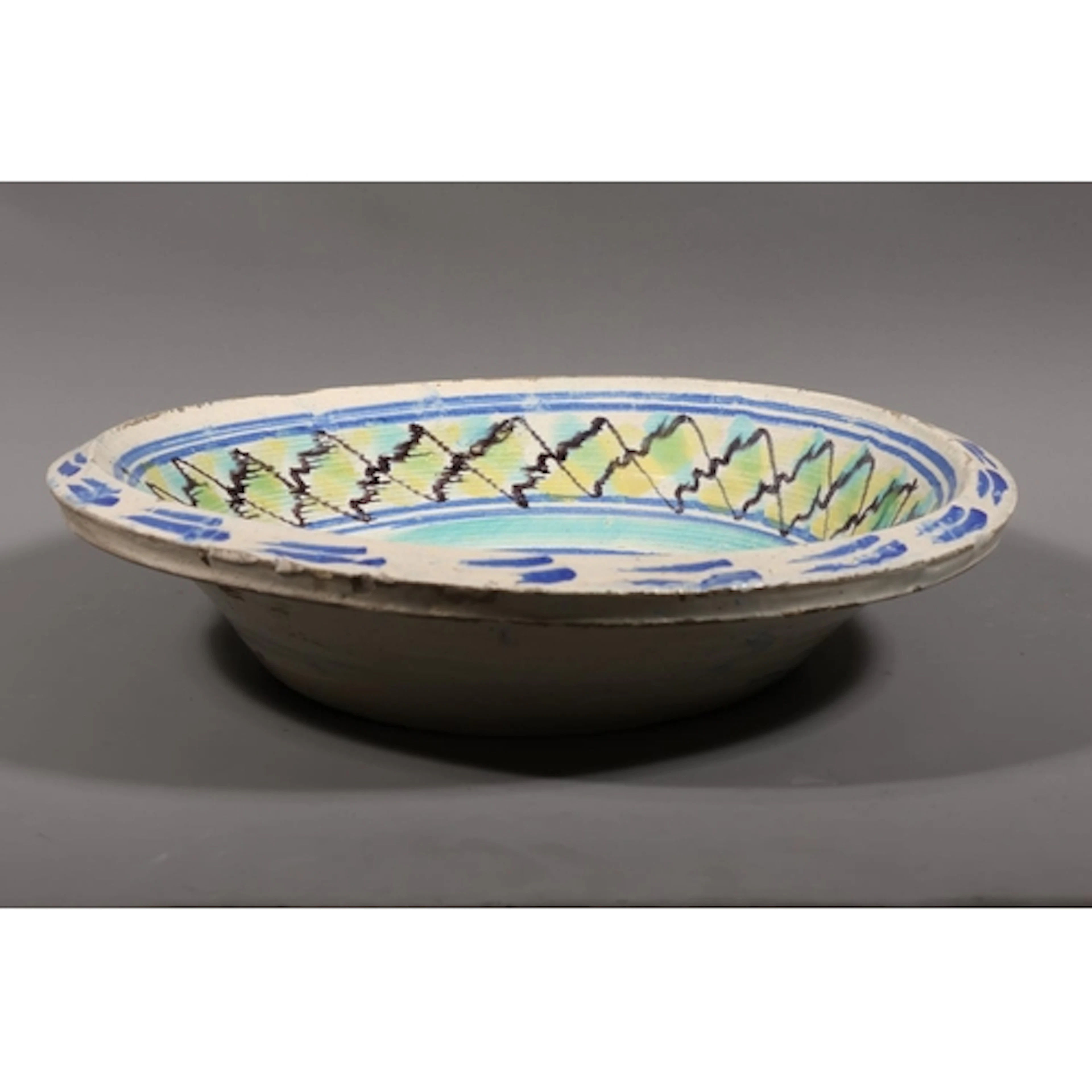 Continental style tin-glazed mixing bowl with simple decorat...