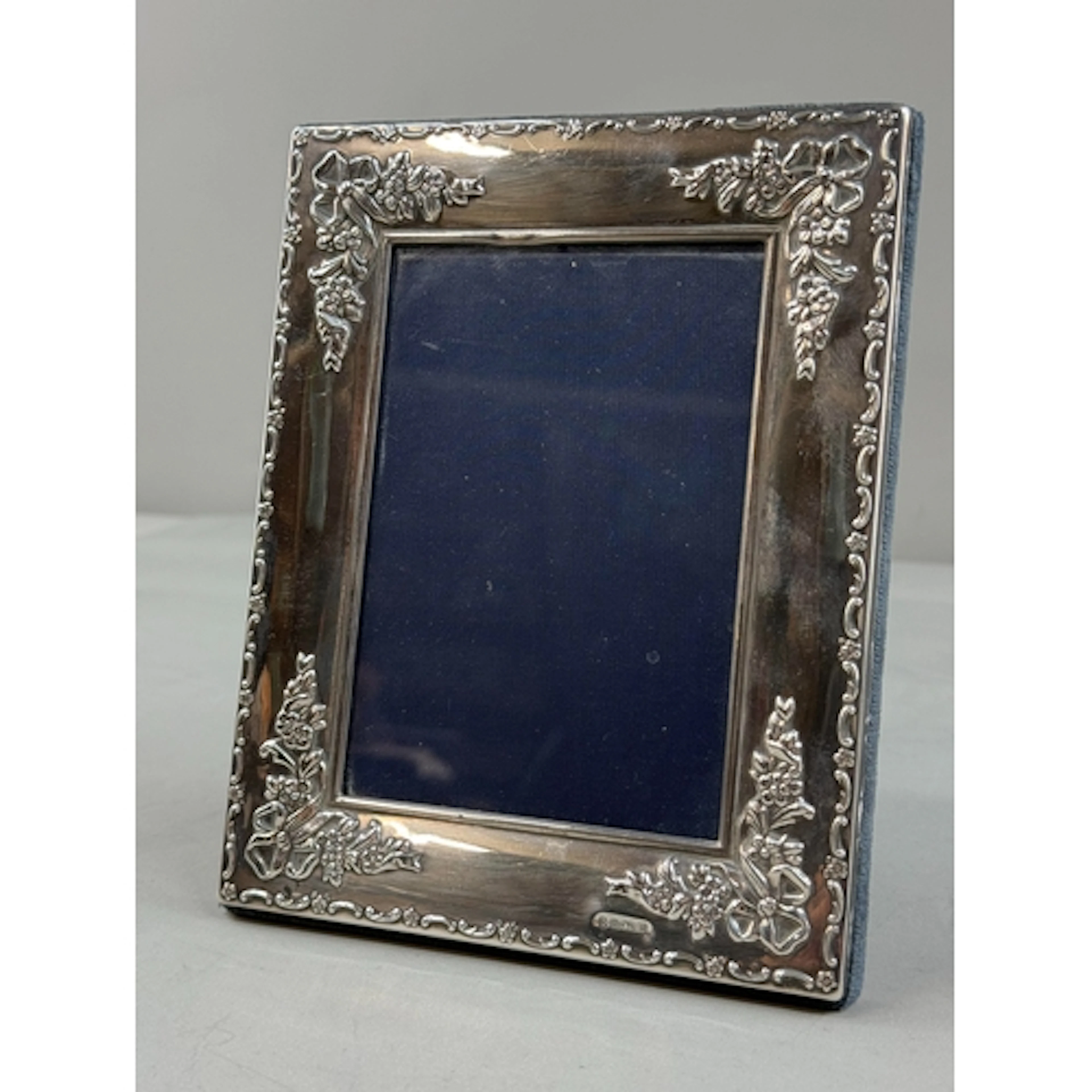 Hallmarked Silver: photograph frame, with ribbon and floral ...