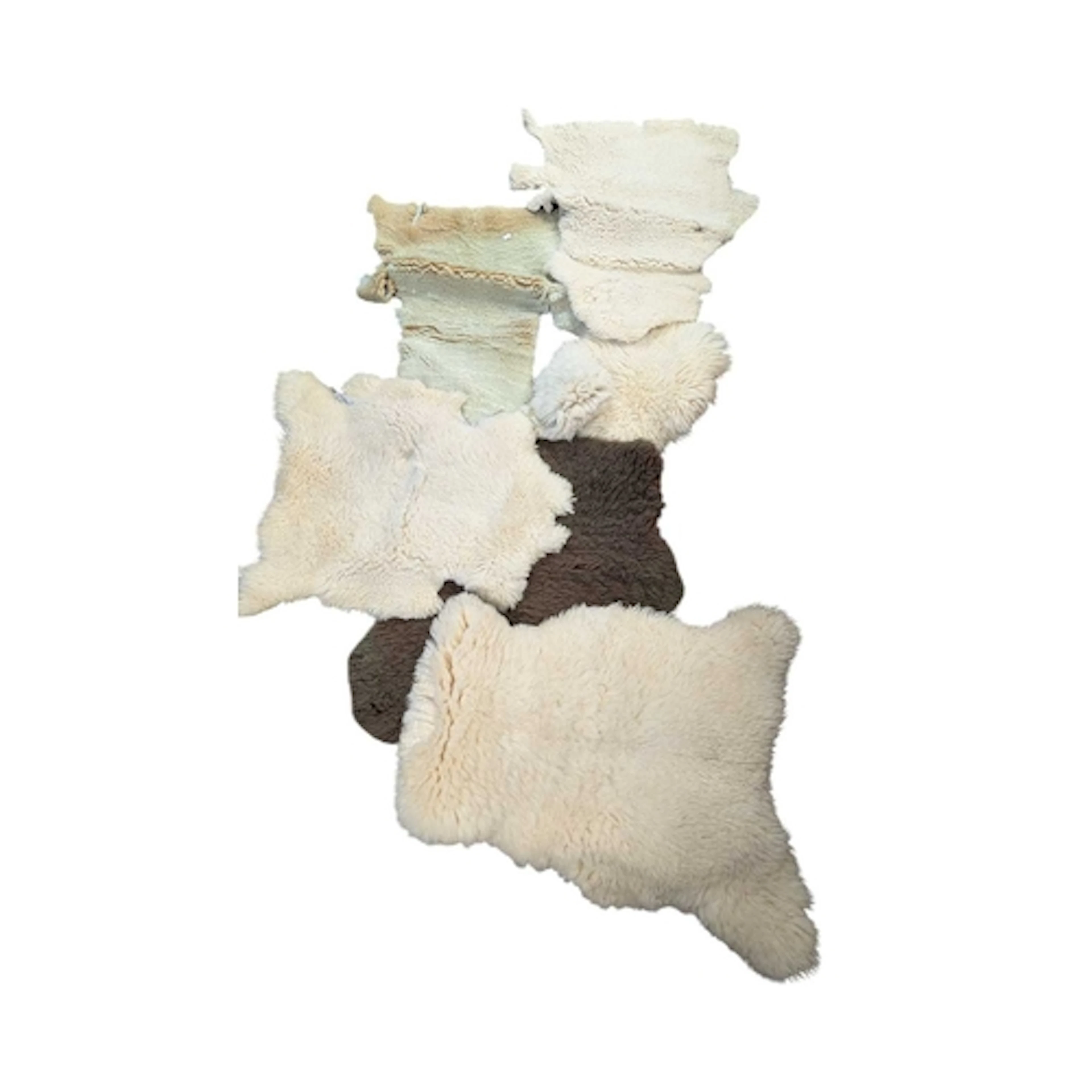 A quantity of 20th century sheepskin pelts and floor rugs, e...