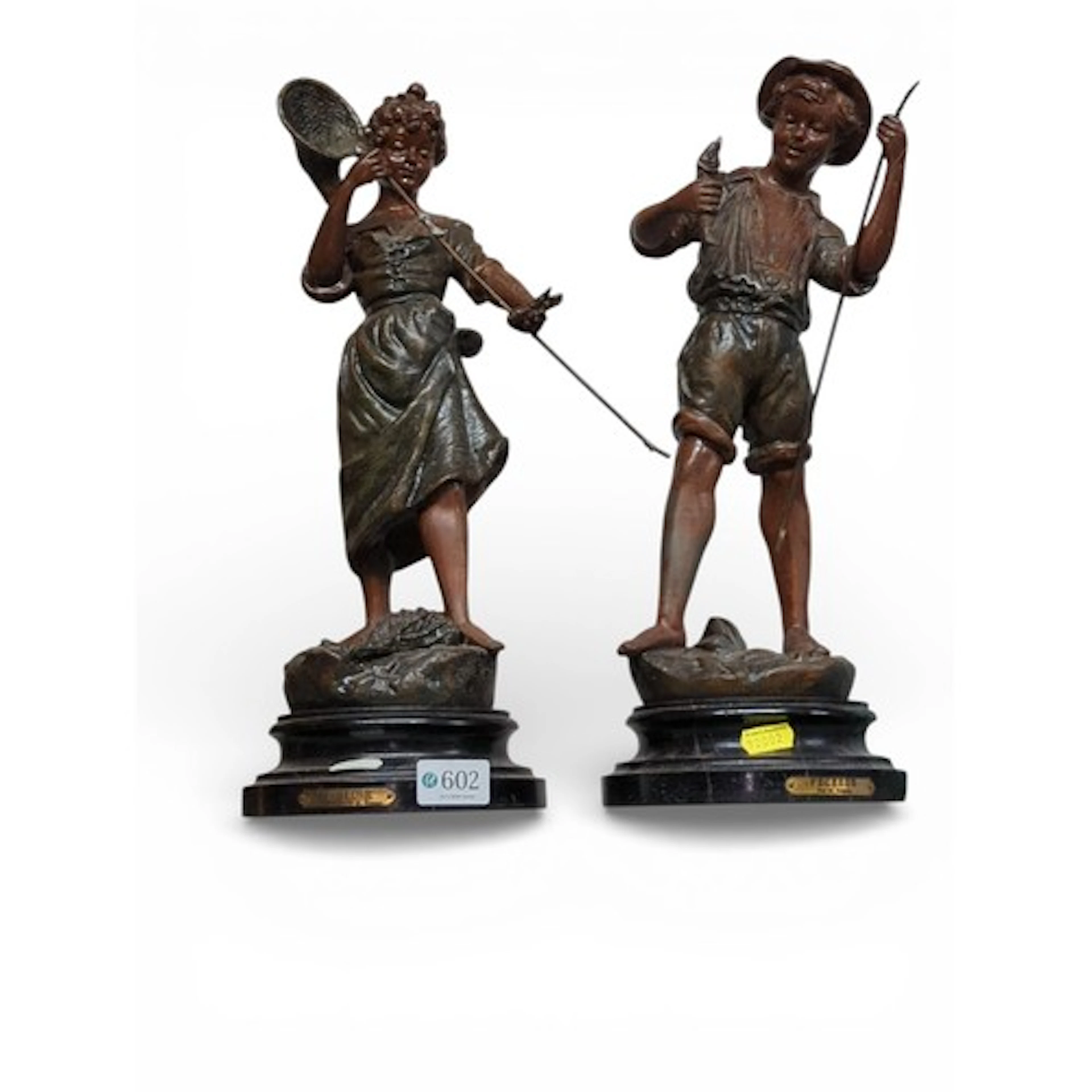 Pair of patinated spelter figural sculptures of youthful ang...