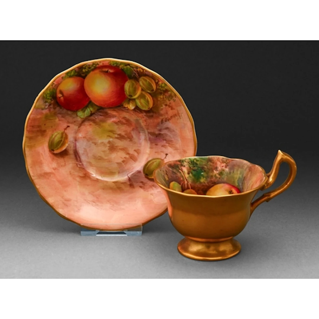 A Royal Worcester teacup and saucer, 1938 and 1941, painted ...