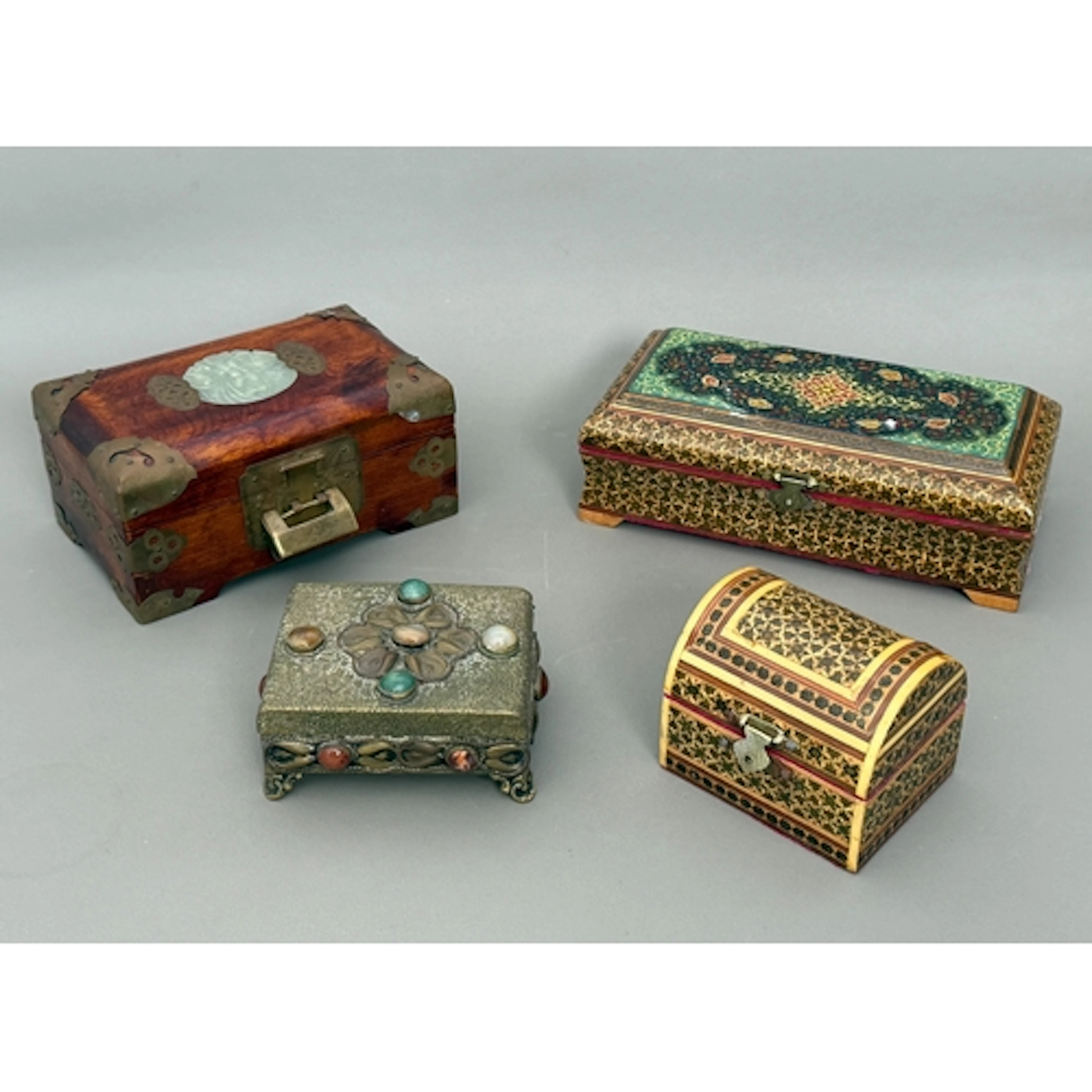 A group of four decorative jewellery and trinket boxes - a P...