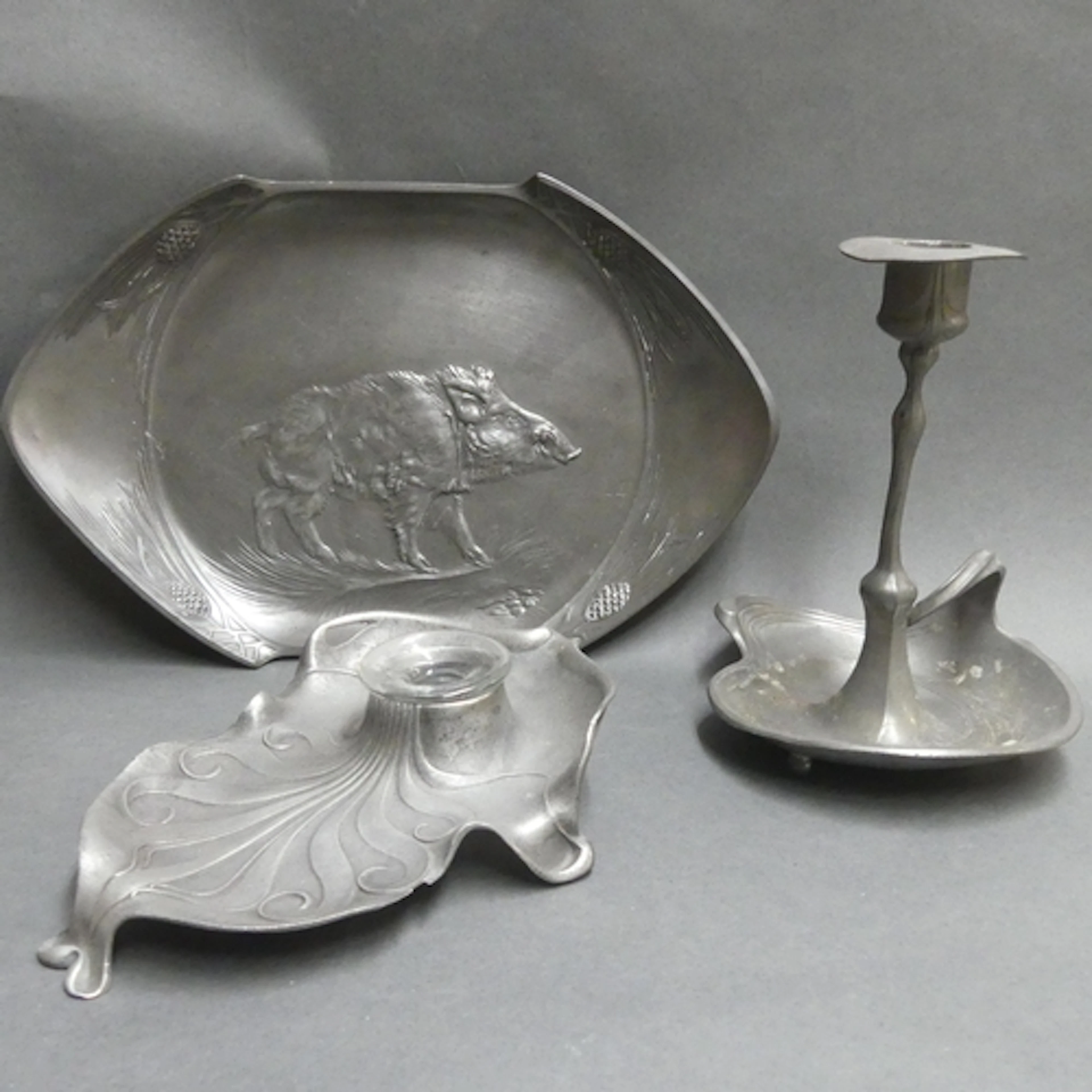 ORIVIT - Three pieces of Art Nouveau pewter, including boar ...