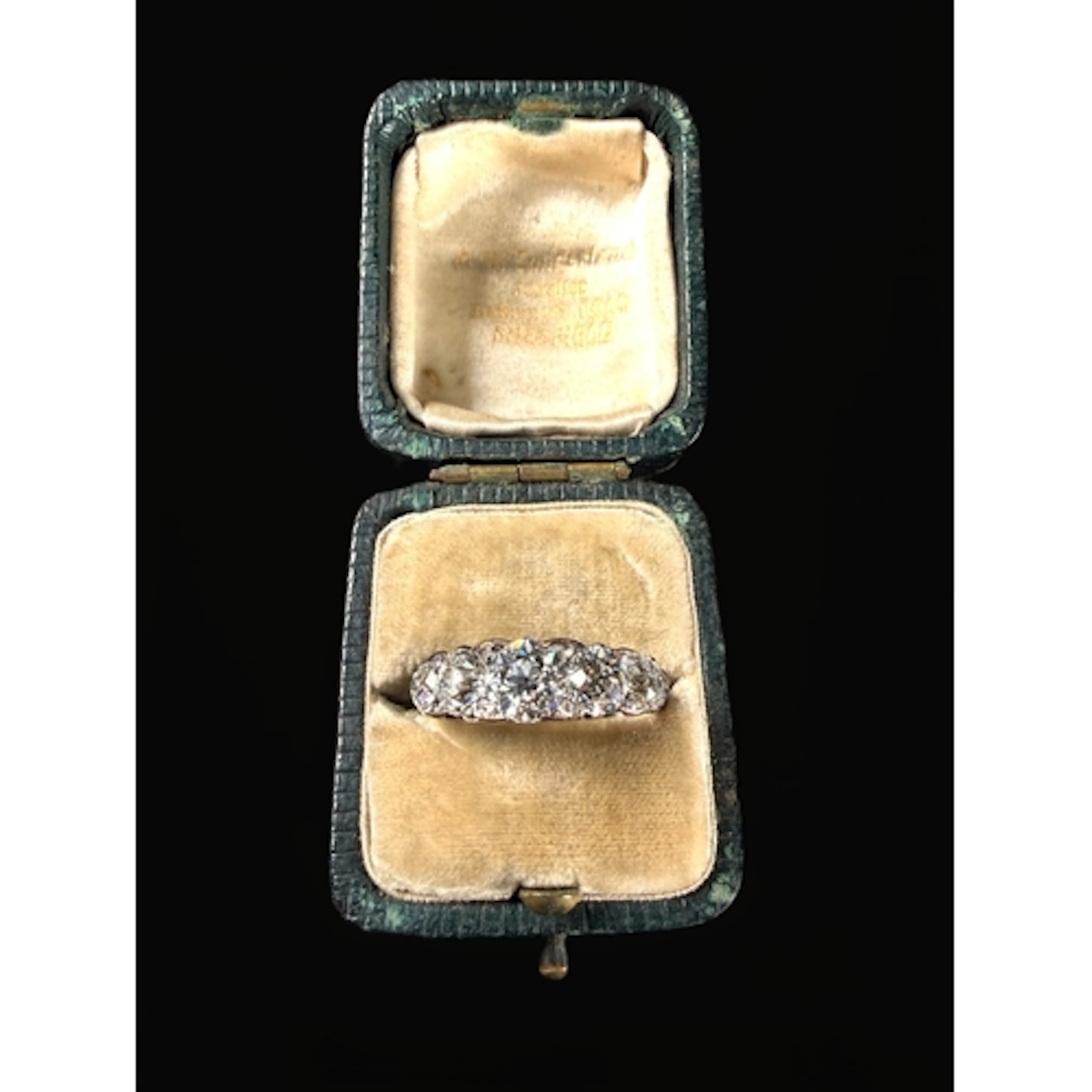 A Victorian yellow metal dress ring set with five large grad...