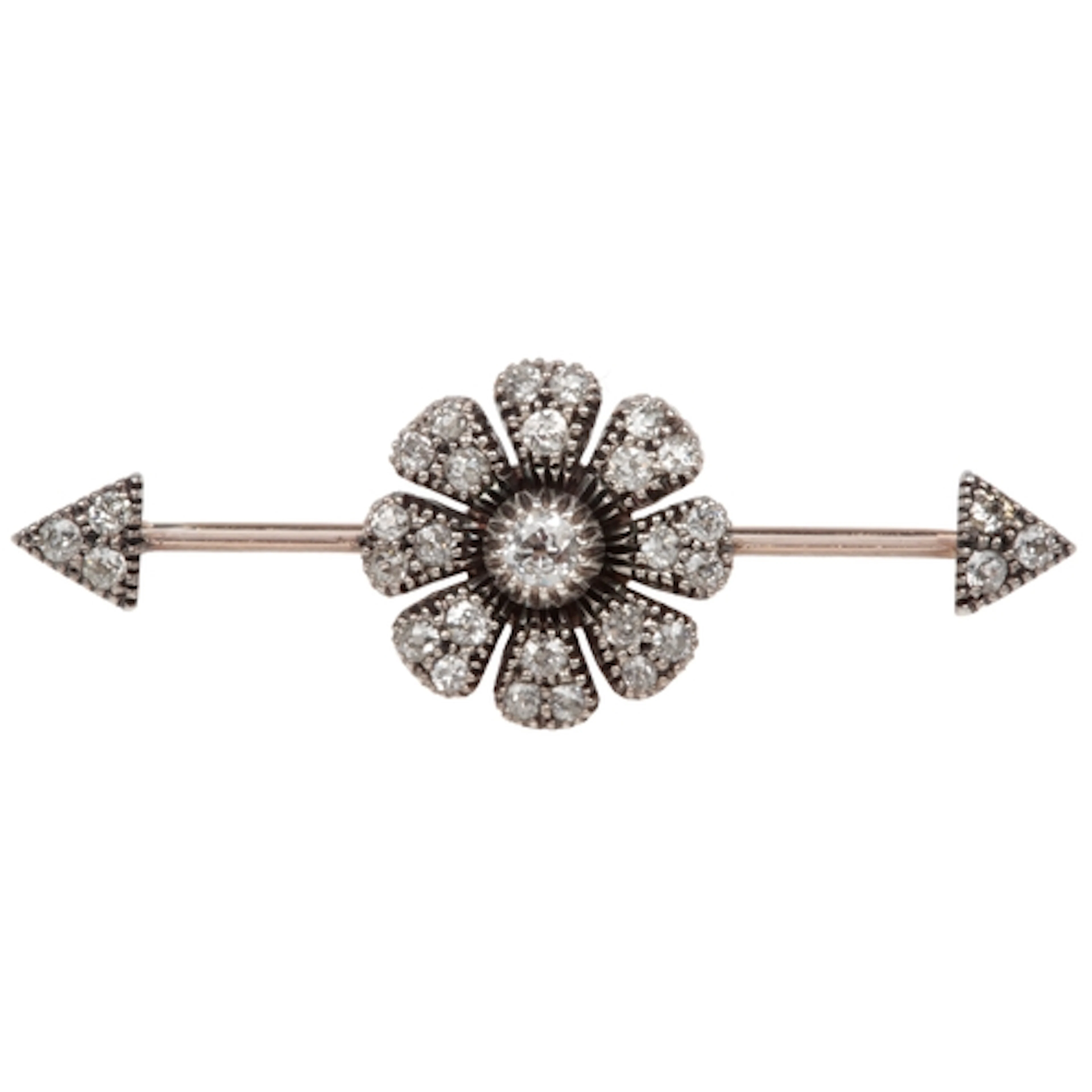 A diamond bar brooch, late 19th century, centring on a flora...