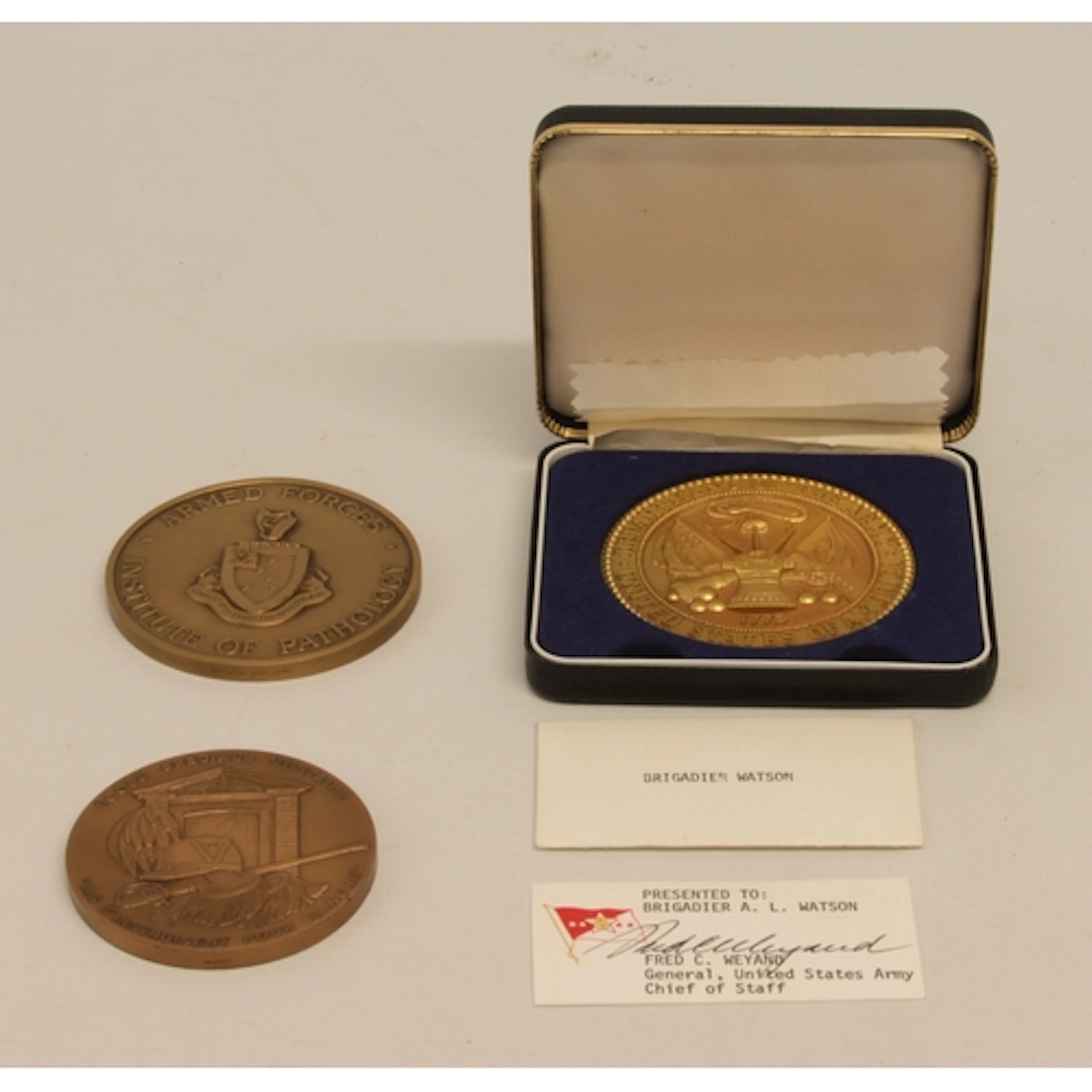 Three military related medallions: 1. A USA Department of t...