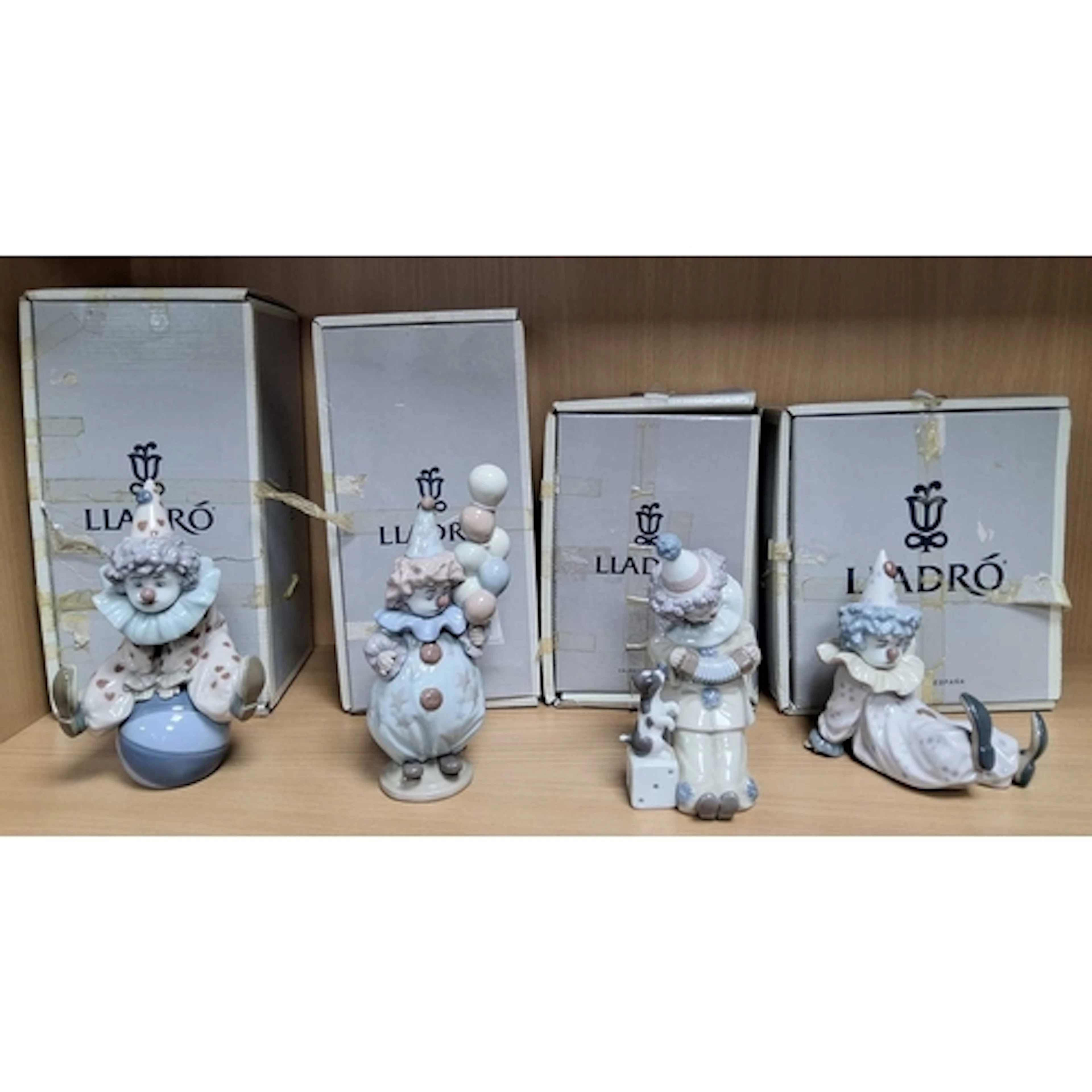 FOUR BOXED LLADRO CLOWN FIGURES, comprising Tired Friend mod...