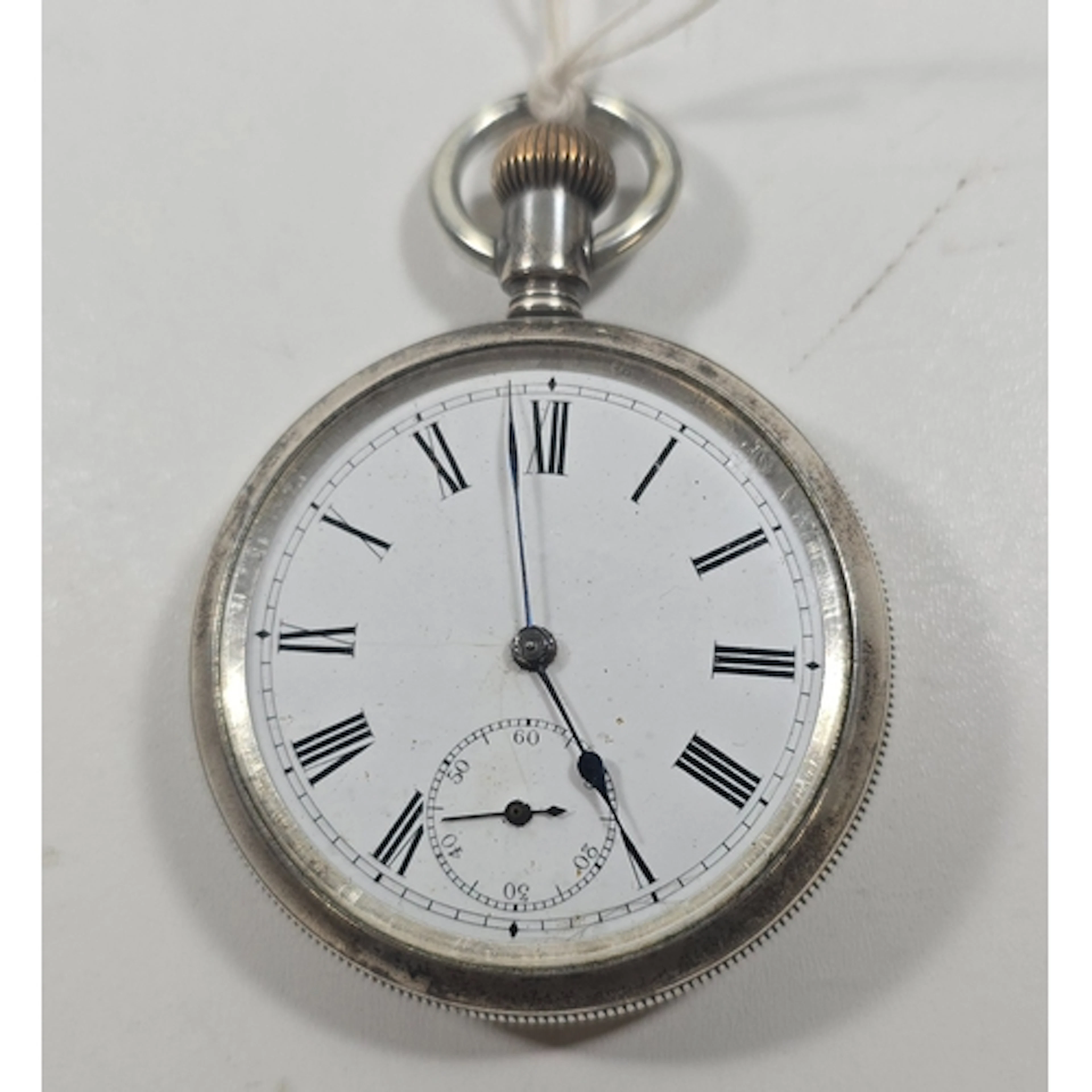 An American sterling silver pocket watch, by Waterbury Watch...