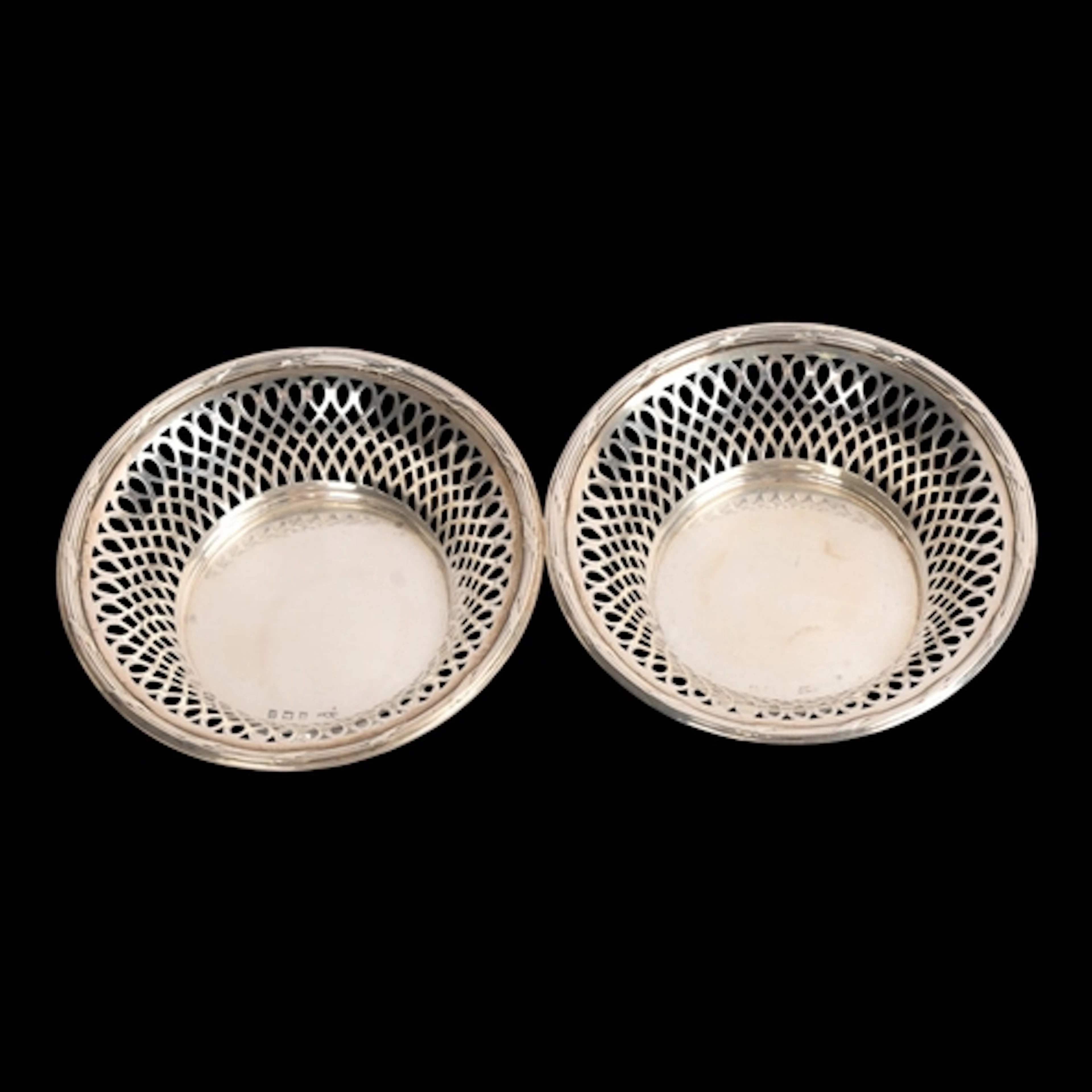 A pair of George V silver bon bon baskets, Gorham Manufactur...