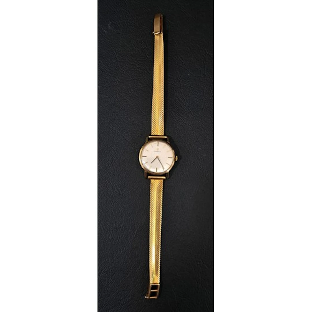 LADIES OMEGA NINE CARAT GOLD CASED WRISTWATCH the champagne ...