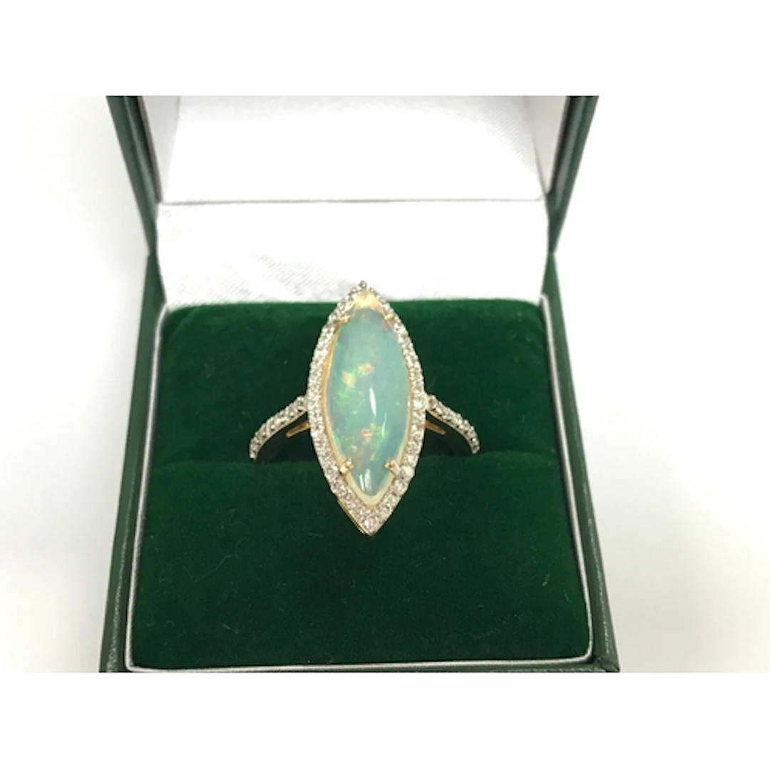 14ct (unmarked) gold marquise shaped ring set with marquise ...