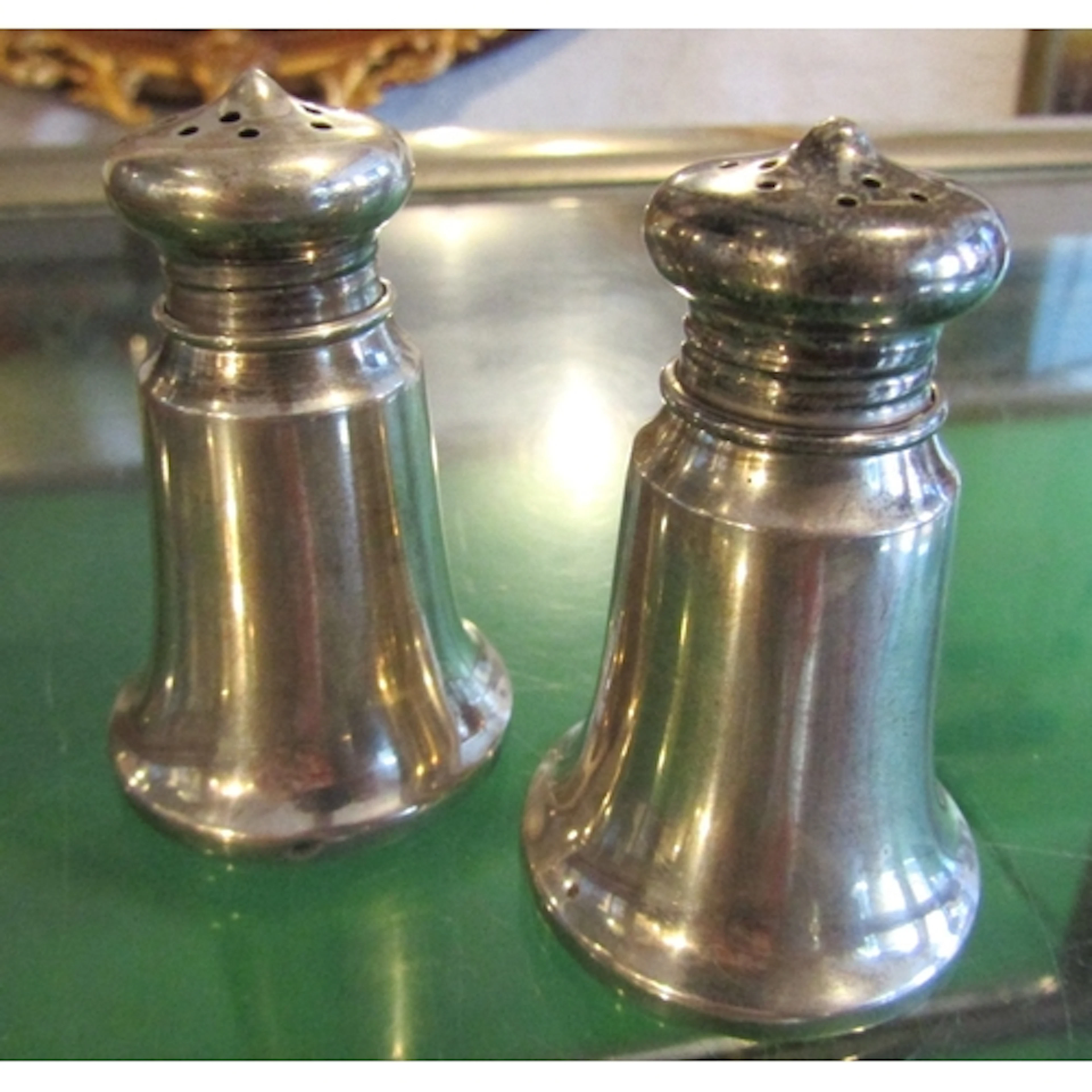 Pair of Silver Bell Form Salt and Peppers