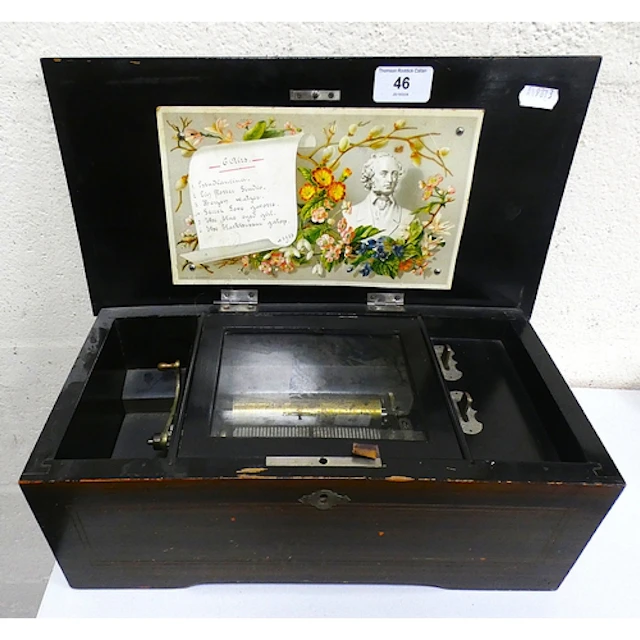 Antique Swiss rosewood cased music box.