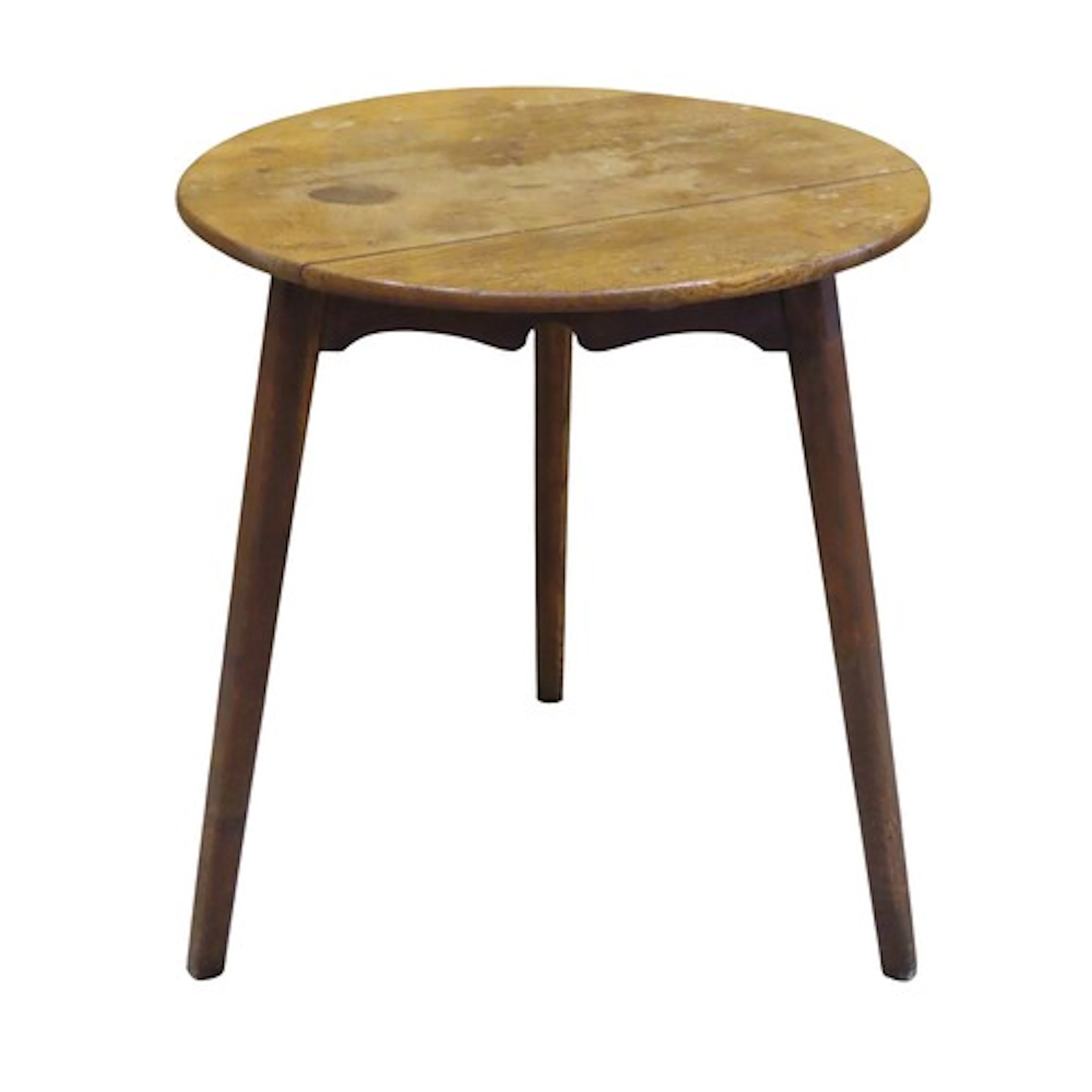 A arts and crafts style oak cricket table with shaped frieze...