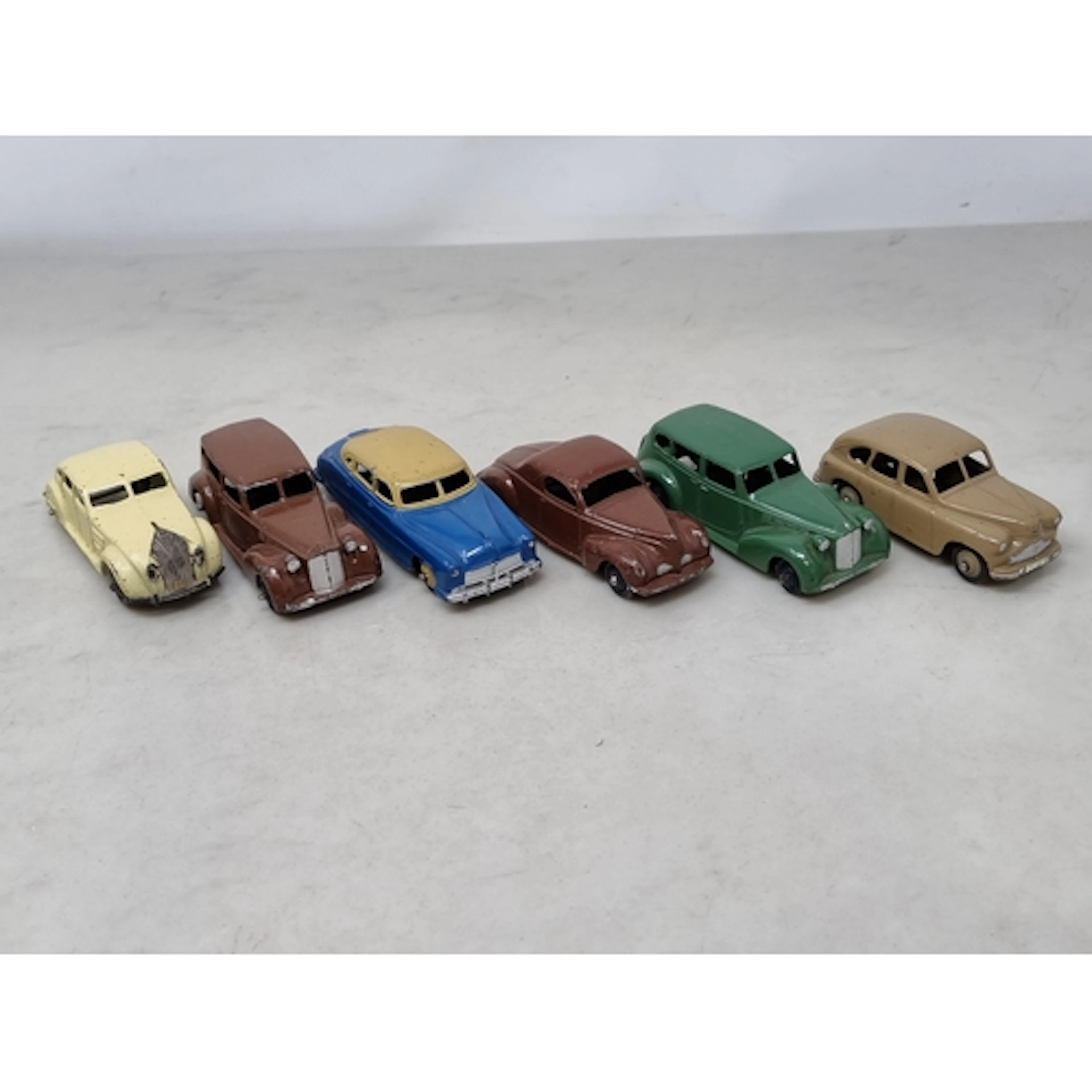 Six unboxed Dinky Toys including Lincoln Zephyr, Hudson Seda...