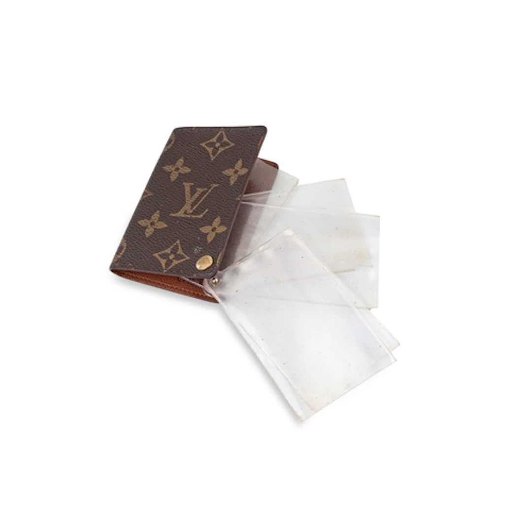 A LOUIS VUITTON MONOGRAM CARD HOLDER, brown coated canvas, L...