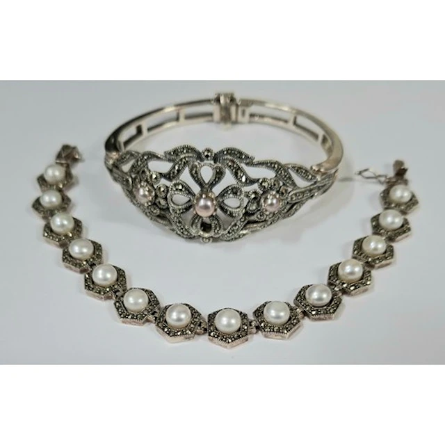 A silver, marcasite and pink pearl hinged bangle, together w...