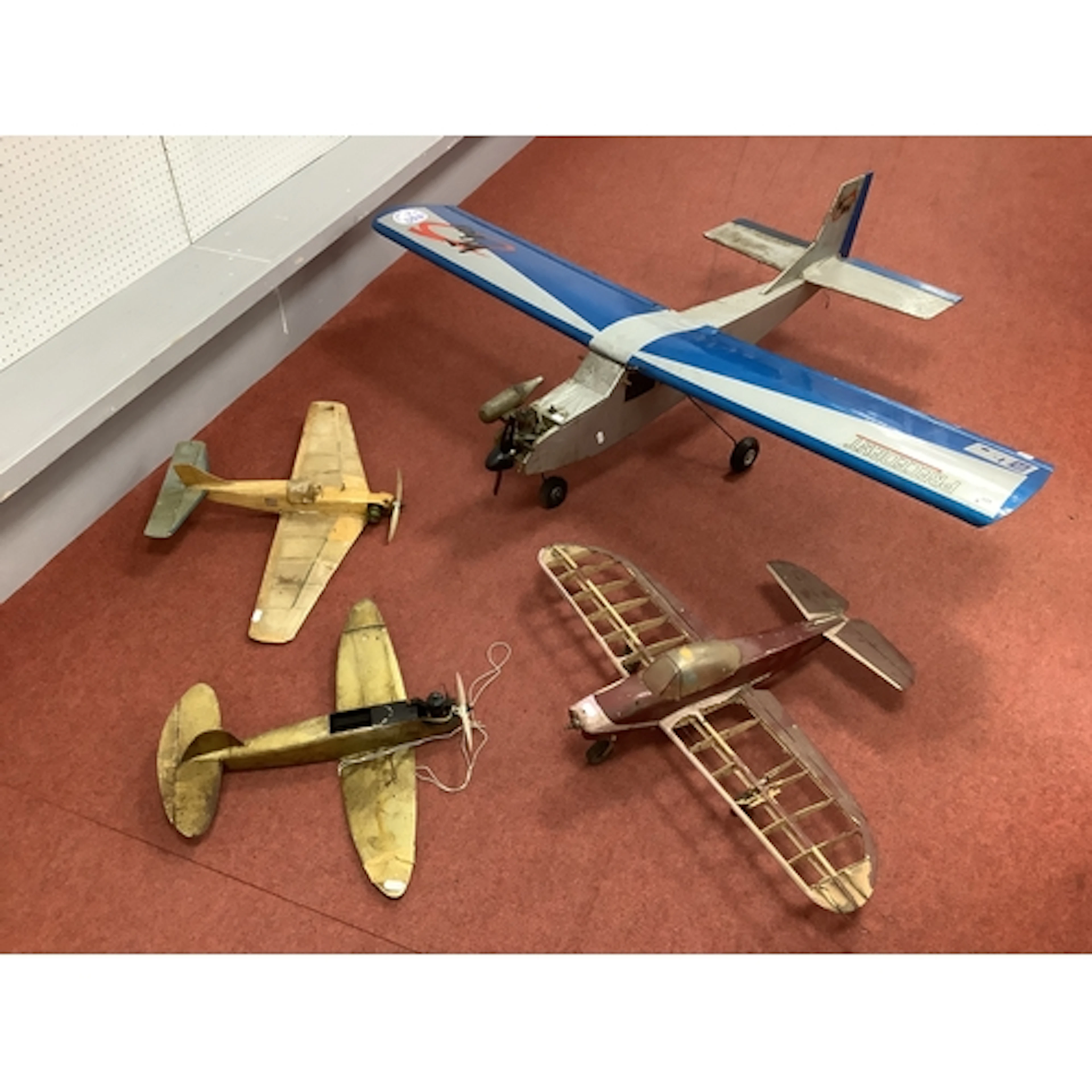 Four 'mostly constructed' model aircraft. All with aero engi...