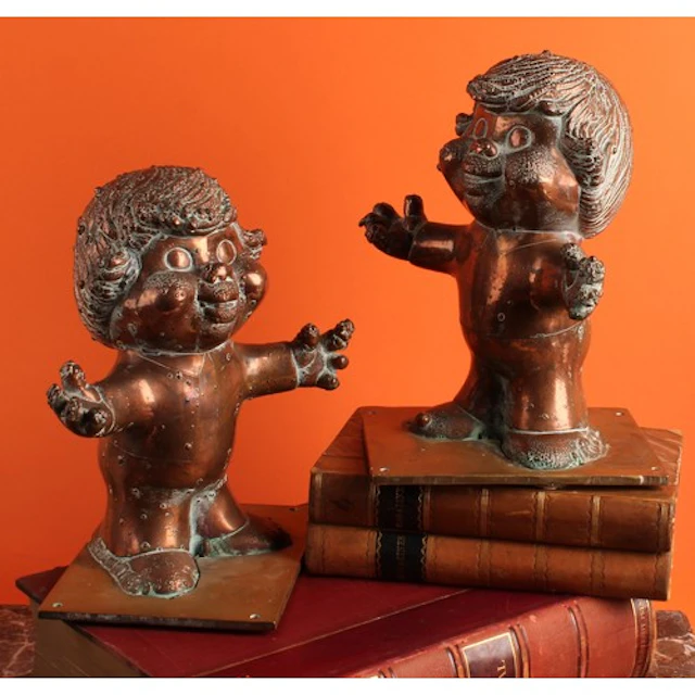 A pair of copper and brass figural moulds, of heavy gauge, e...