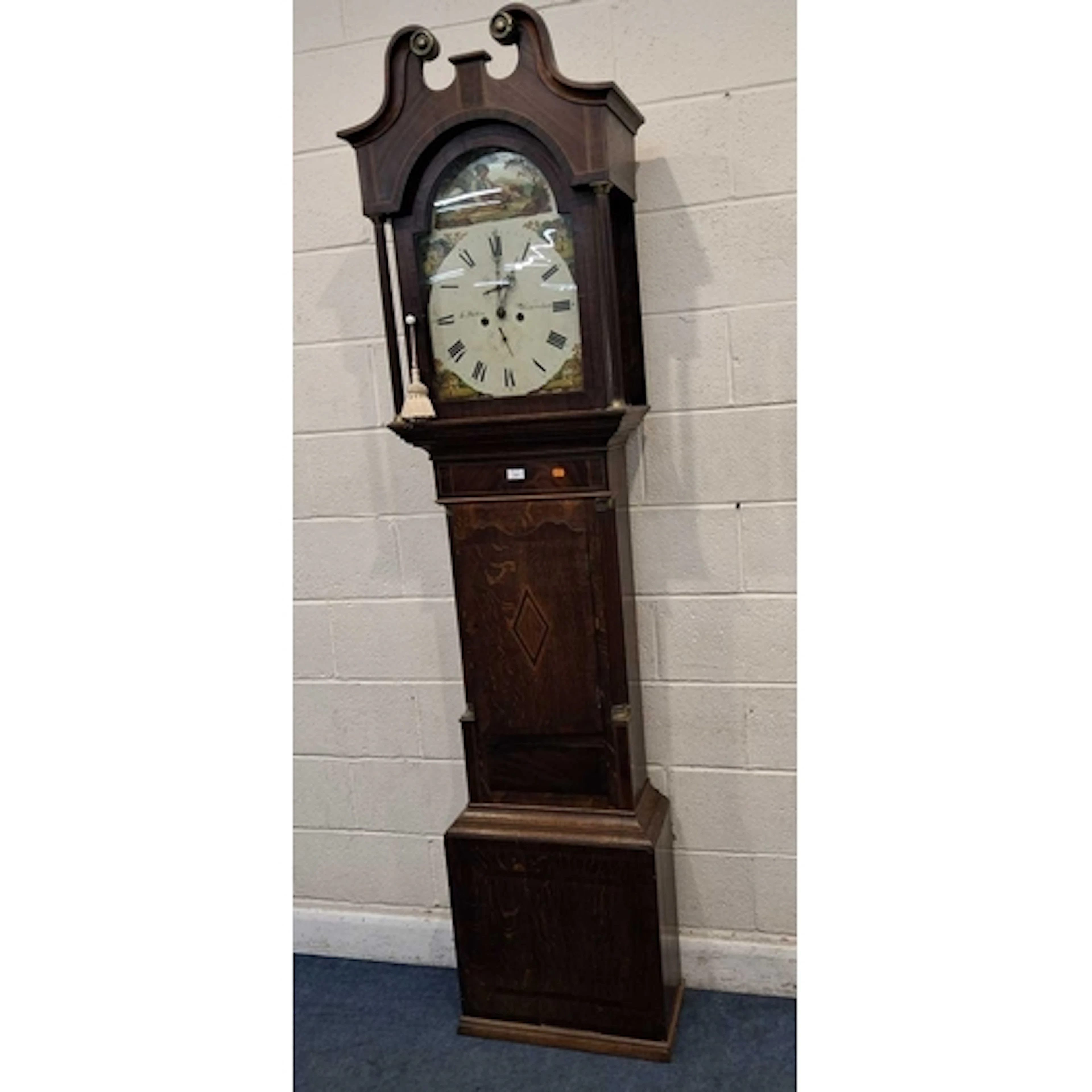 A GEORGIAN OAK AND MAHOGANY 8 DAY LONGCASE CLOCK, with a twi...