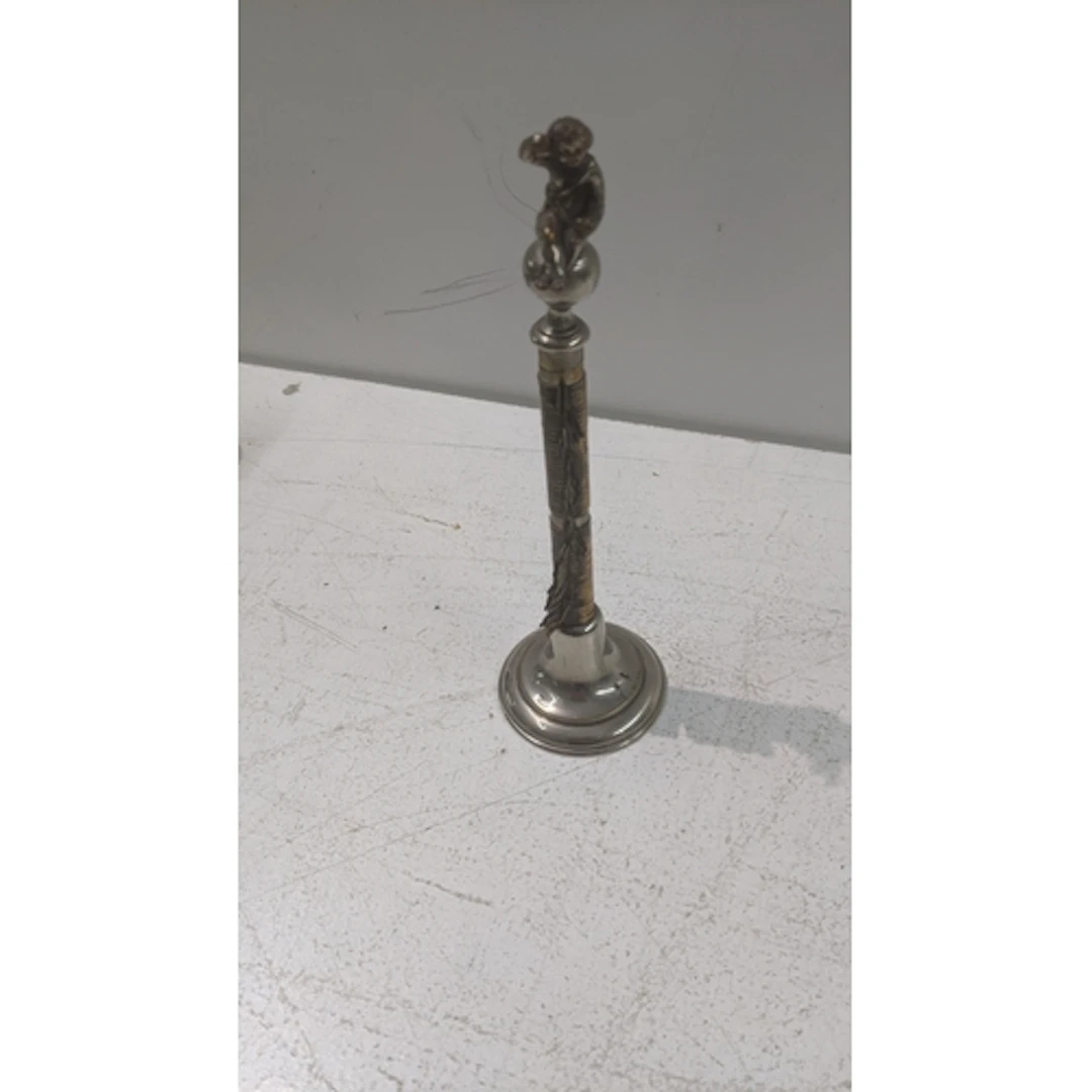 A French silver plated bronze pen holder, having a circular ...