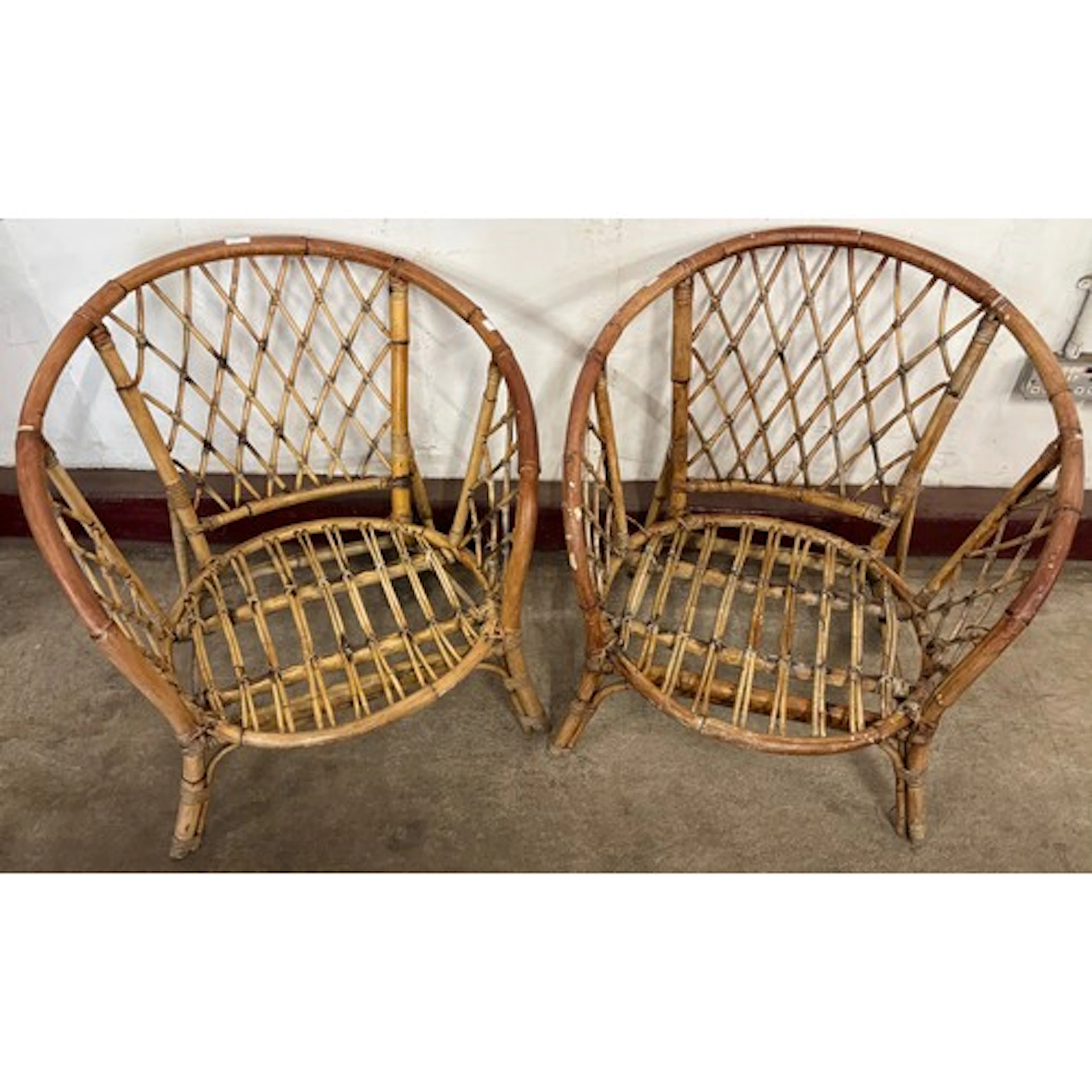 A pair of Italian bamboo lounge chairs