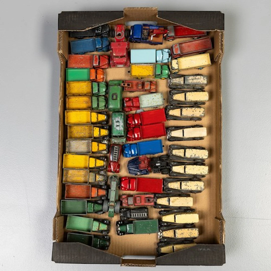 Fruit tray containing 47 commercial vehicles to include: 11 ...