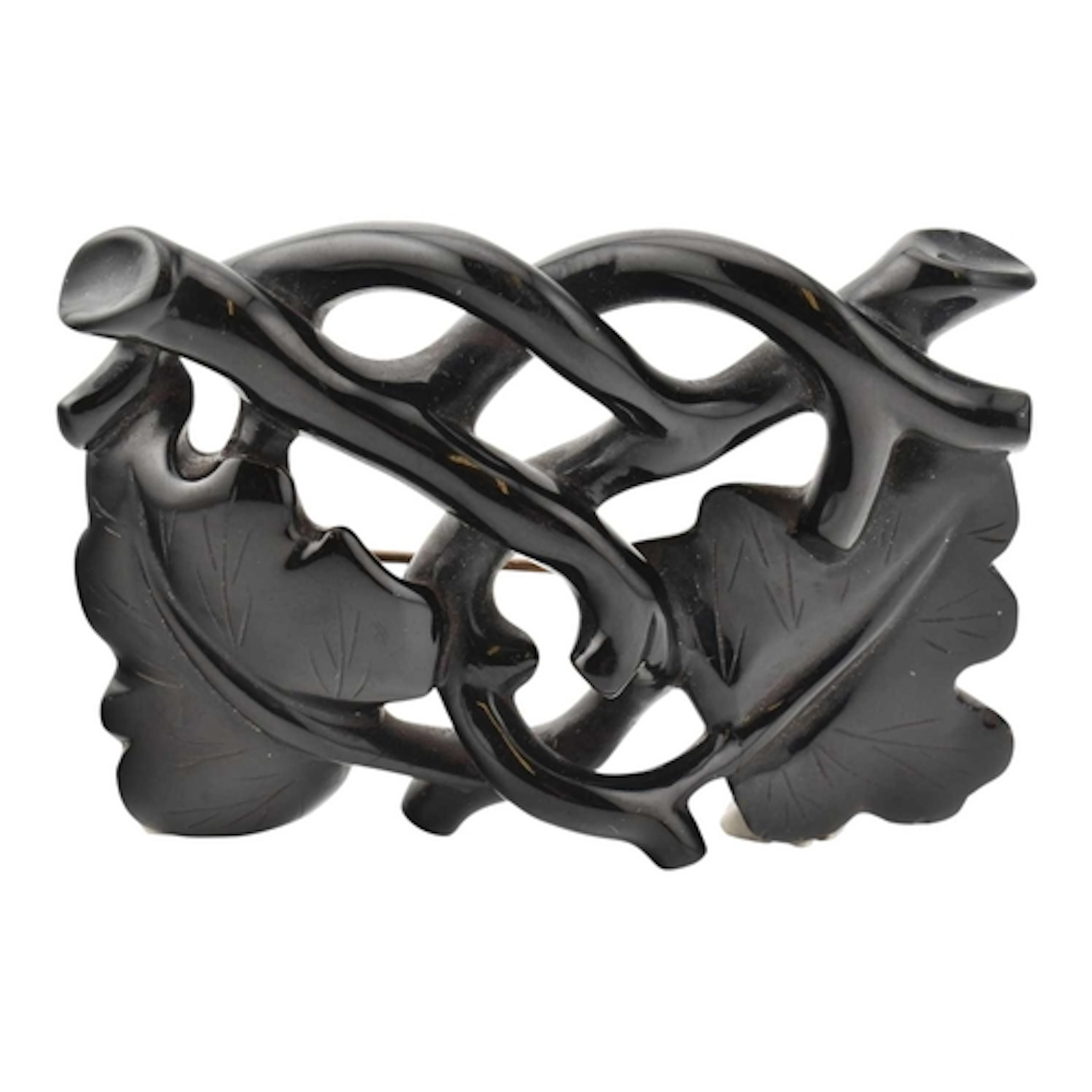 A 19th century Victorian large Whitby jet mourning brooch pi...