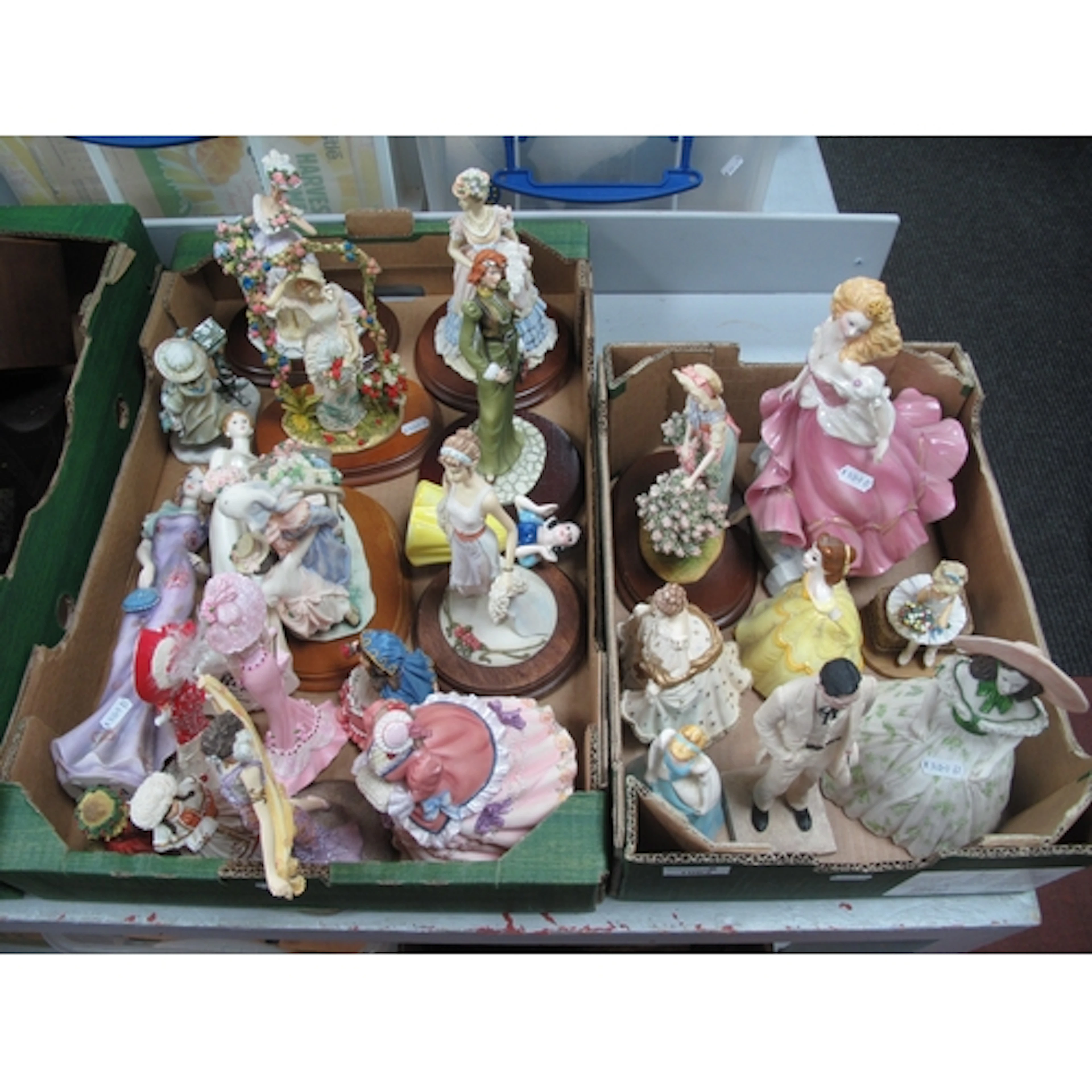 Collection of porcelain and resin figurine ornaments, includ...