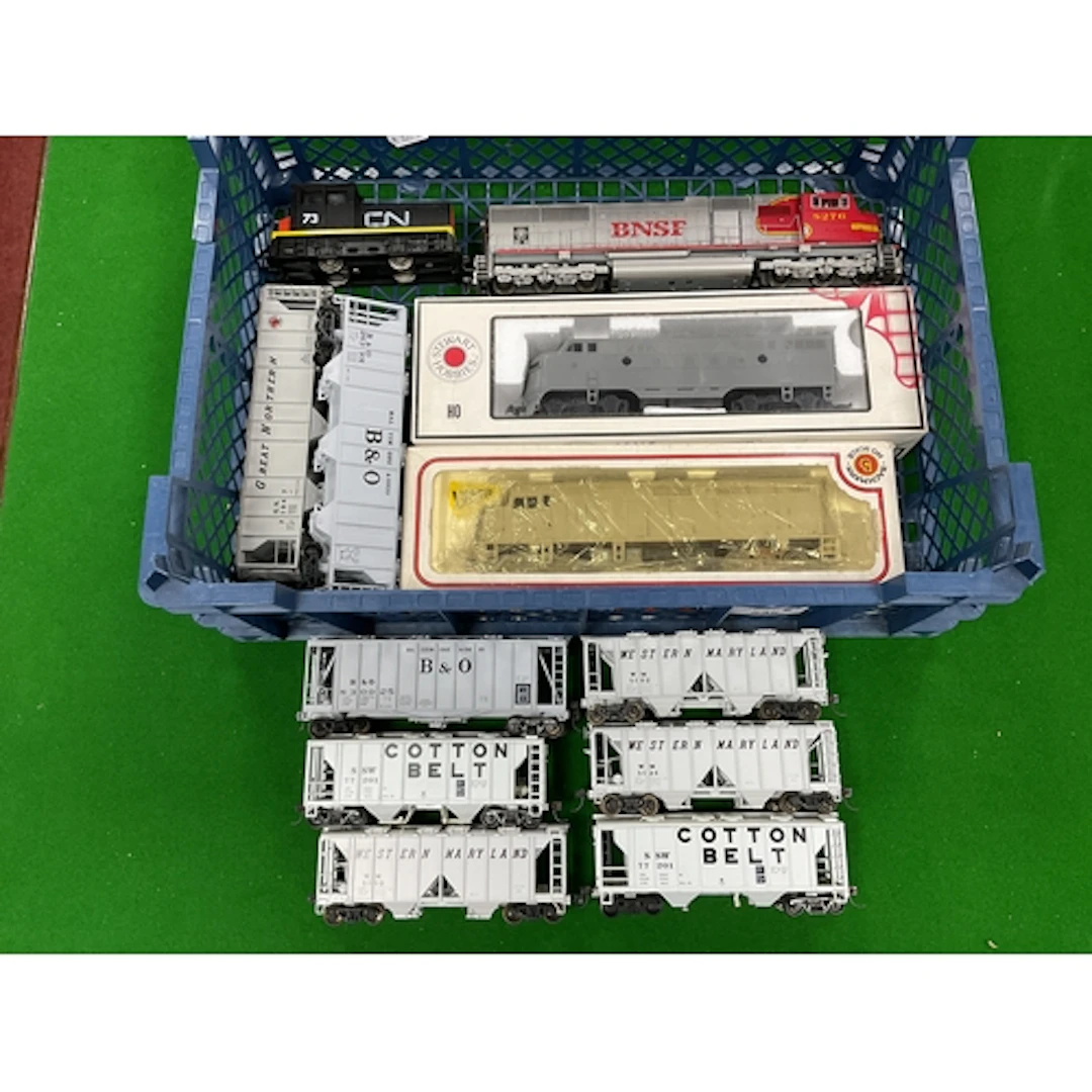 Four HO scale American diesel locomotives: a boxed Stewart H...