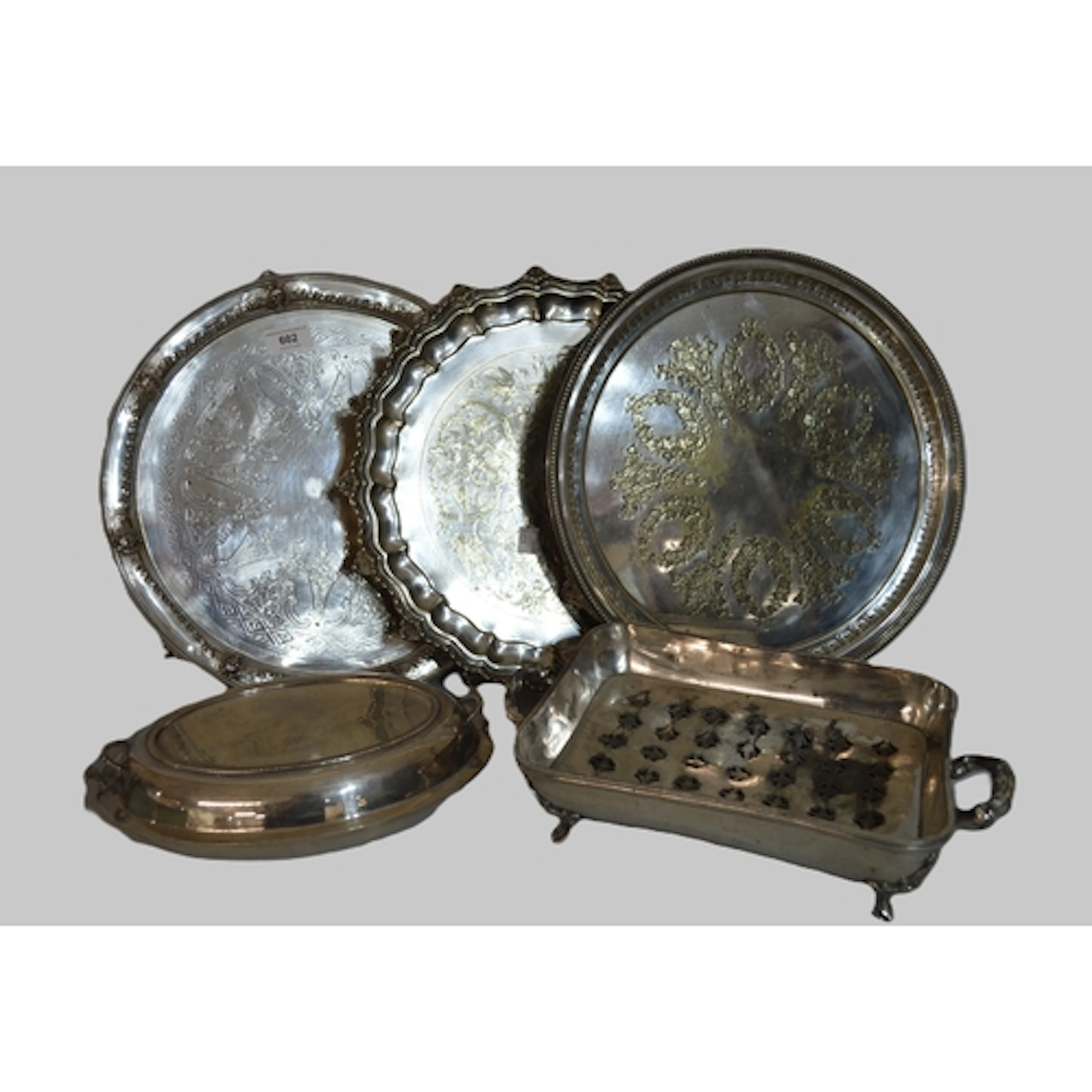 Three various silver plated circular salvers, plated entrée ...