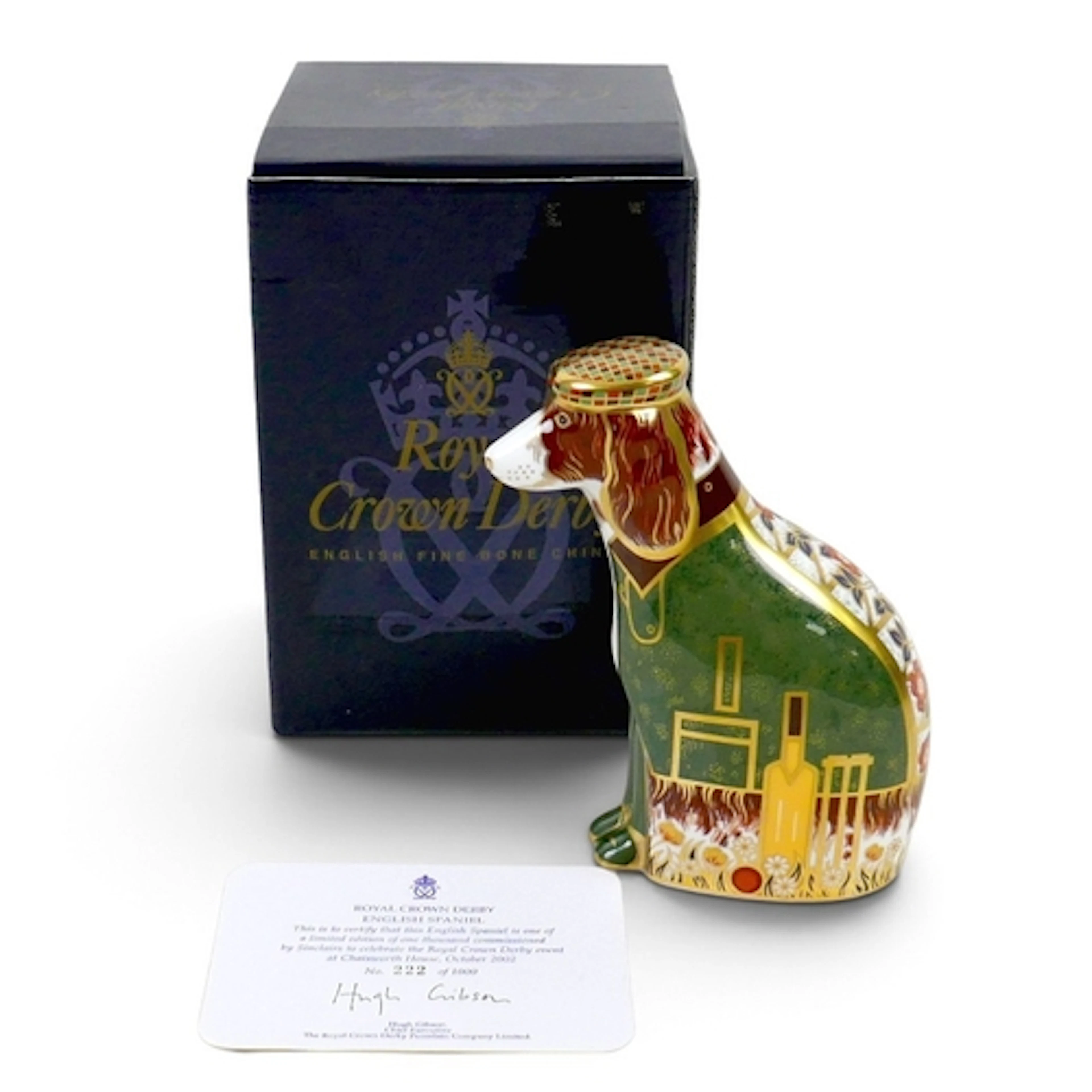 A ROYAL CROWN DERBY ENGLISH SPANIEL PAPERWEIGHT. comprising ...