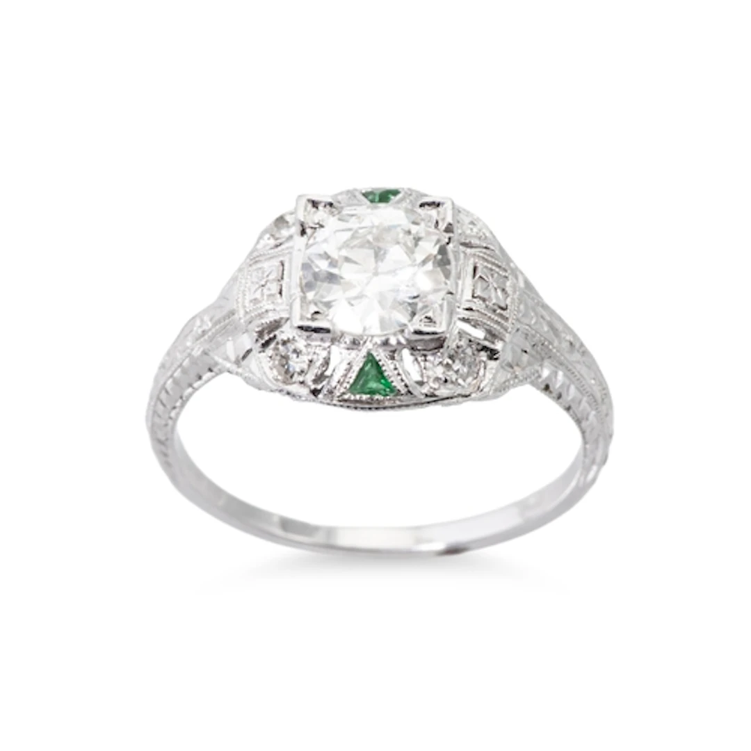 AN EARLY 20TH CENTURY DIAMOND SOLITAIRE RING, the transition...
