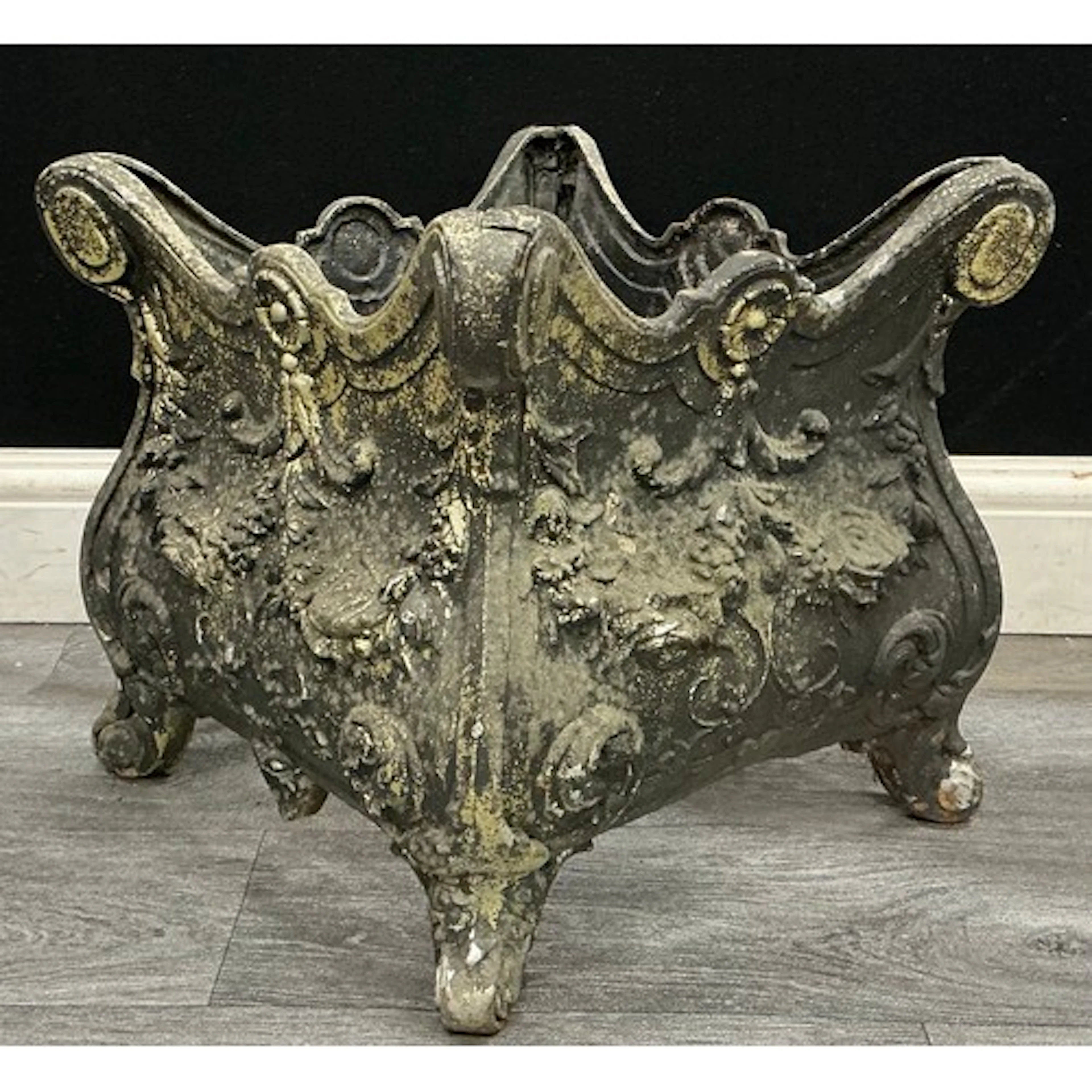 A late 19th century rococo revival cast iron jardiniere, mar...