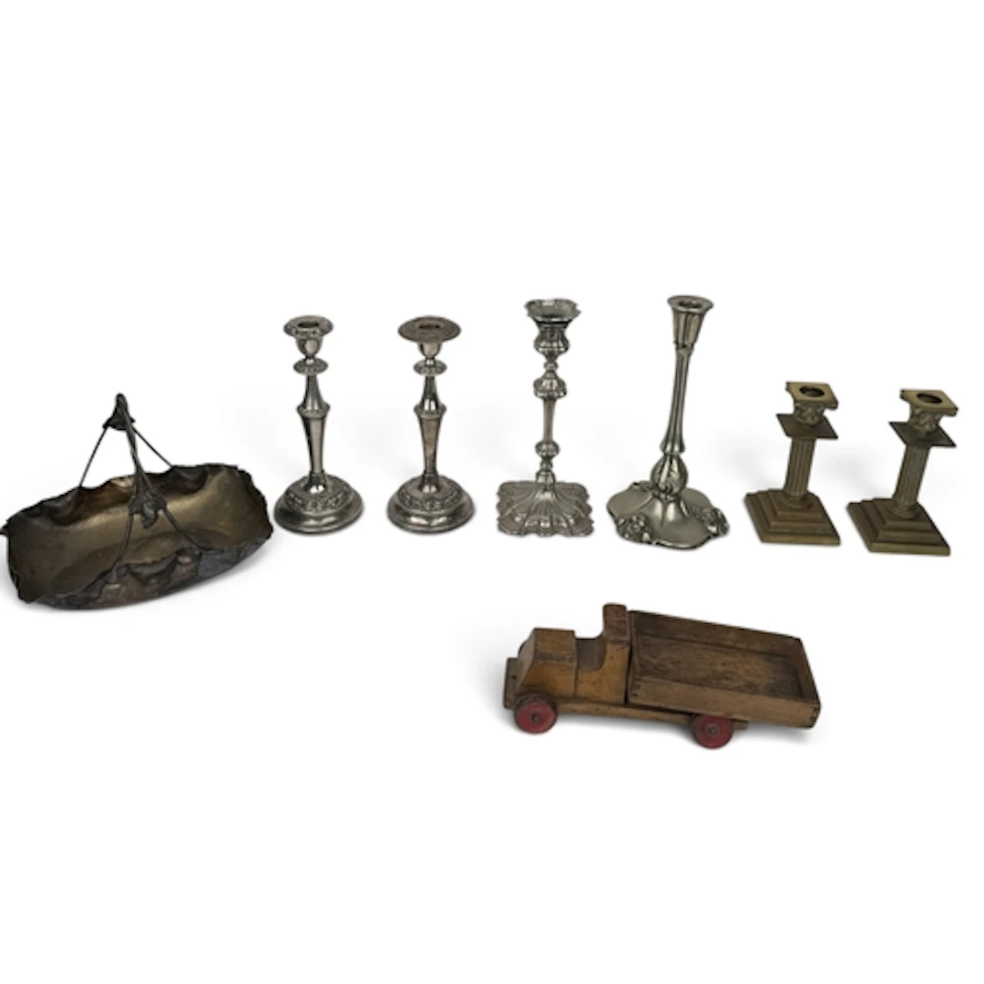 FOUR SILVER PLATED CANDLE STICKS TOGETHER WITH A PAIR OF BRA...
