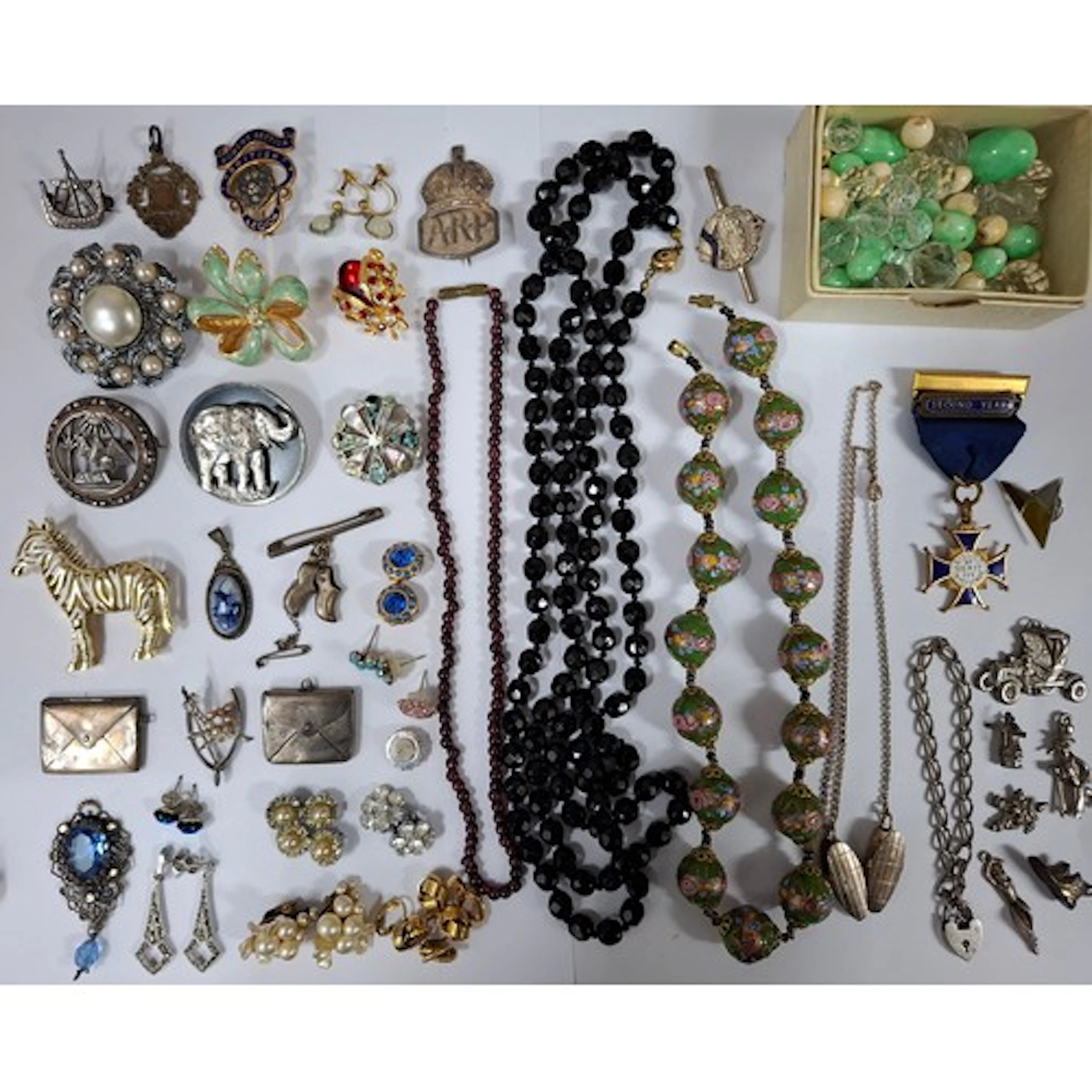 A quantity of vintage costume jewellery to include an Austri...