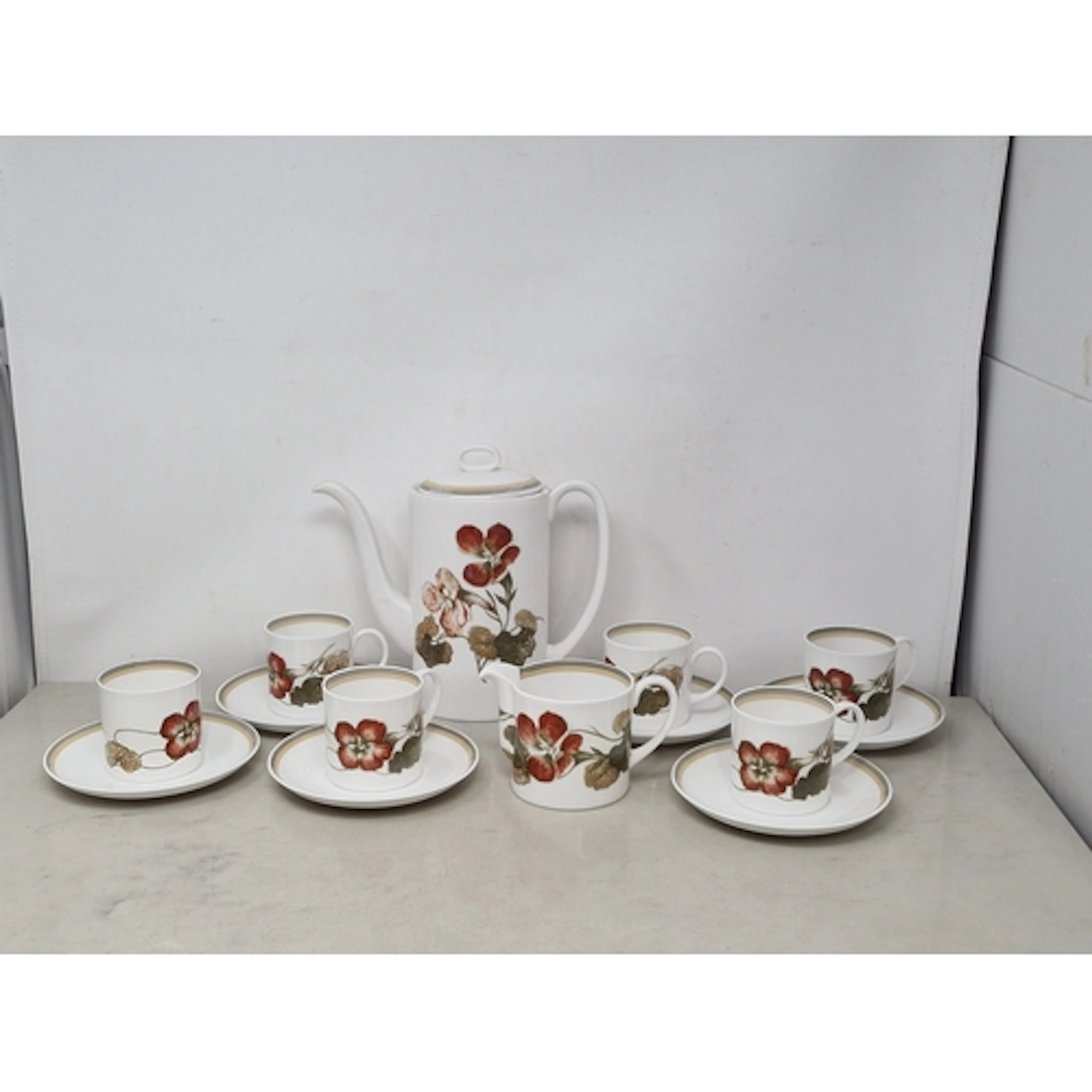 A Susie Cooper Coffee Service for six persons, "Nasturtium" ...