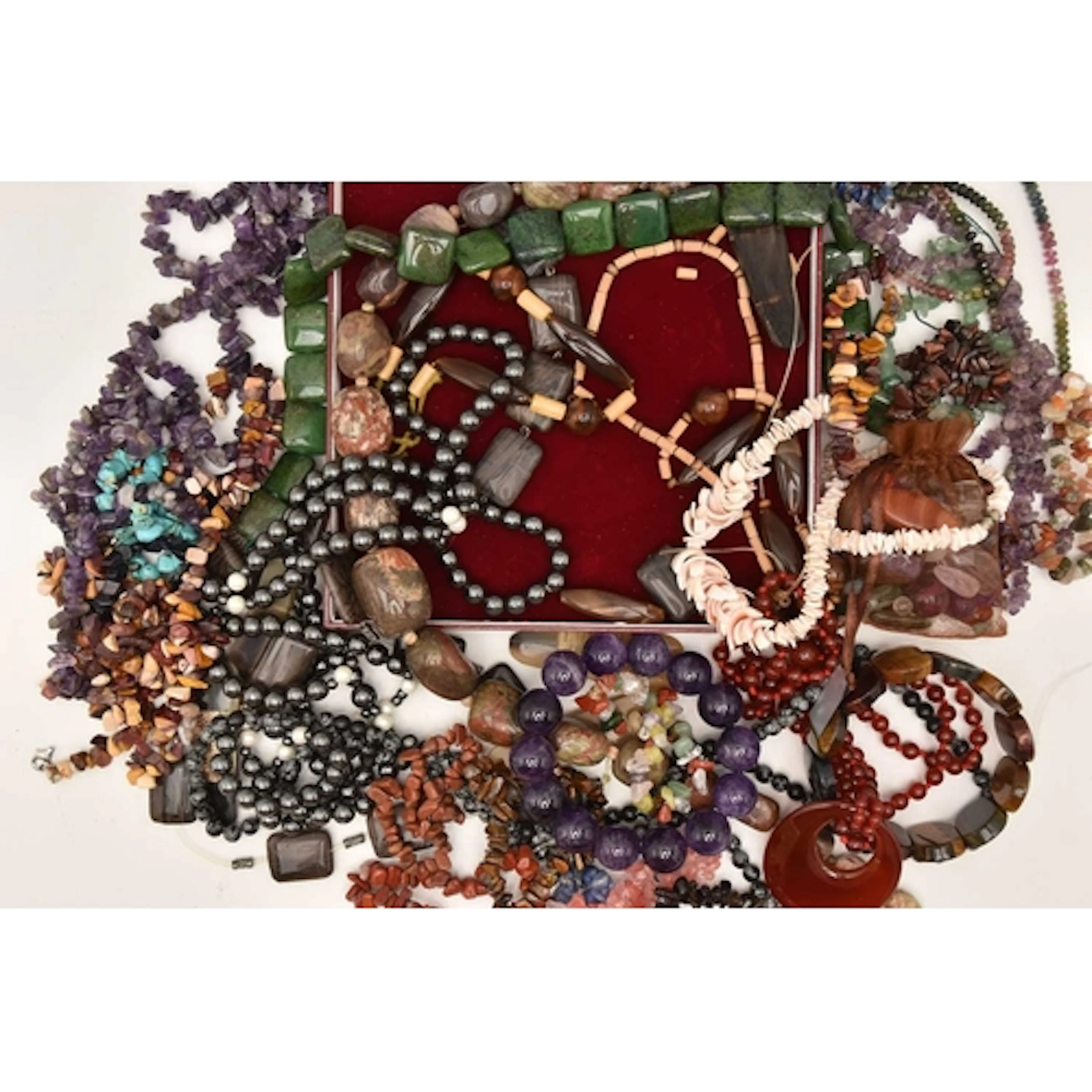 AN ASSORTEMENT OF GEM SET AND HARD STONE BEADED JEWELLERY, s...