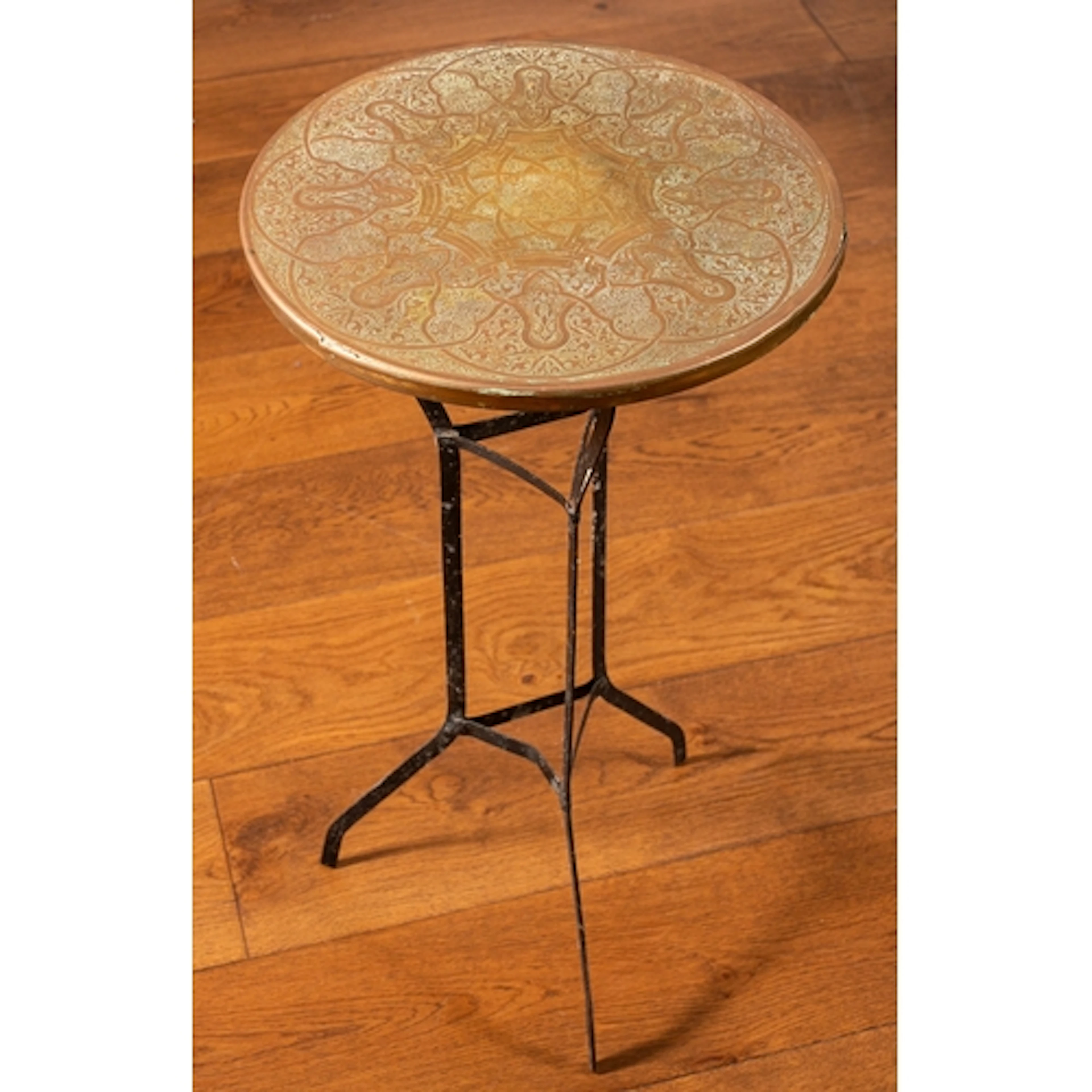 An Indian brass and blacked painted wrought iron mounted cir...