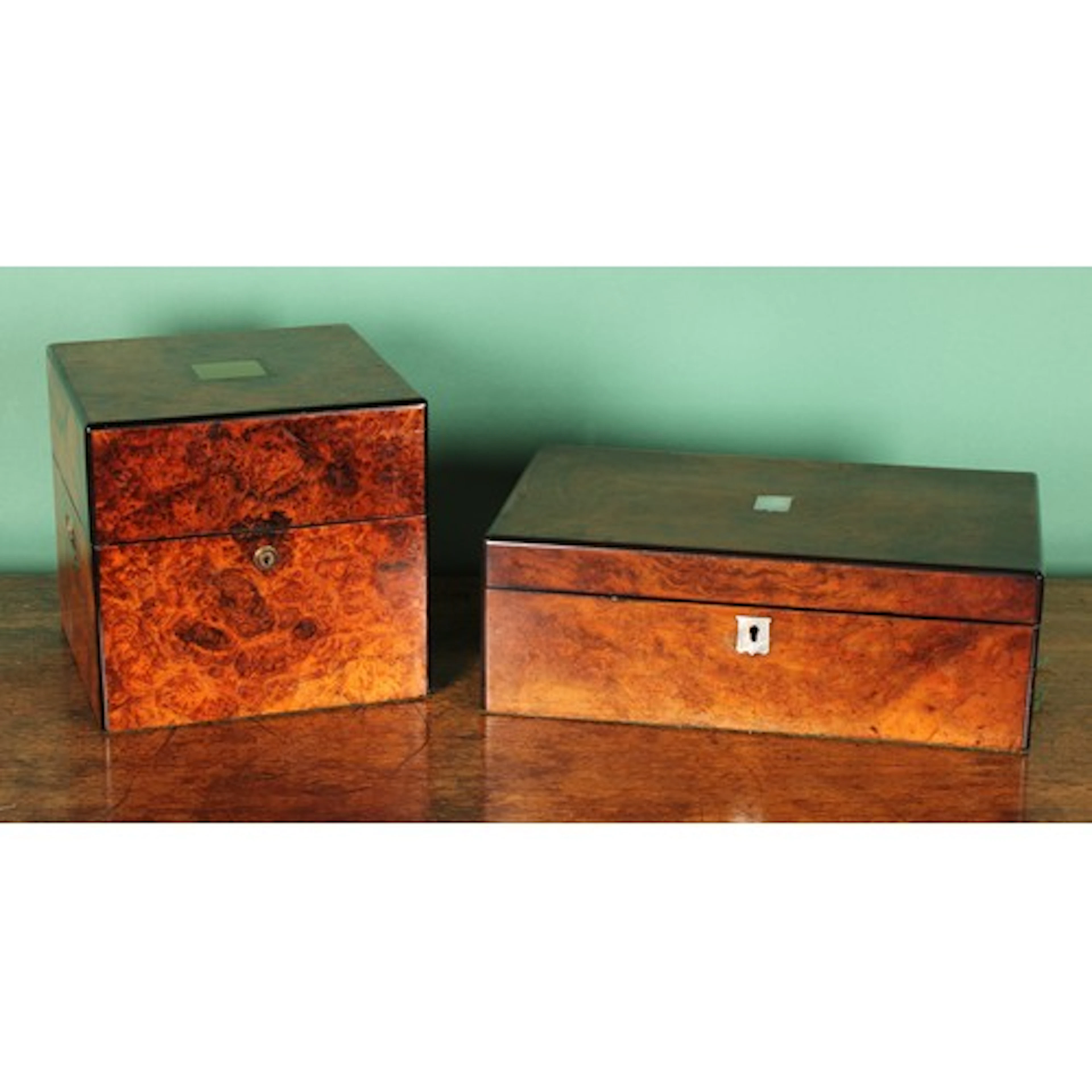 A Victorian burr walnut decanter box, hinged cover enclosing...