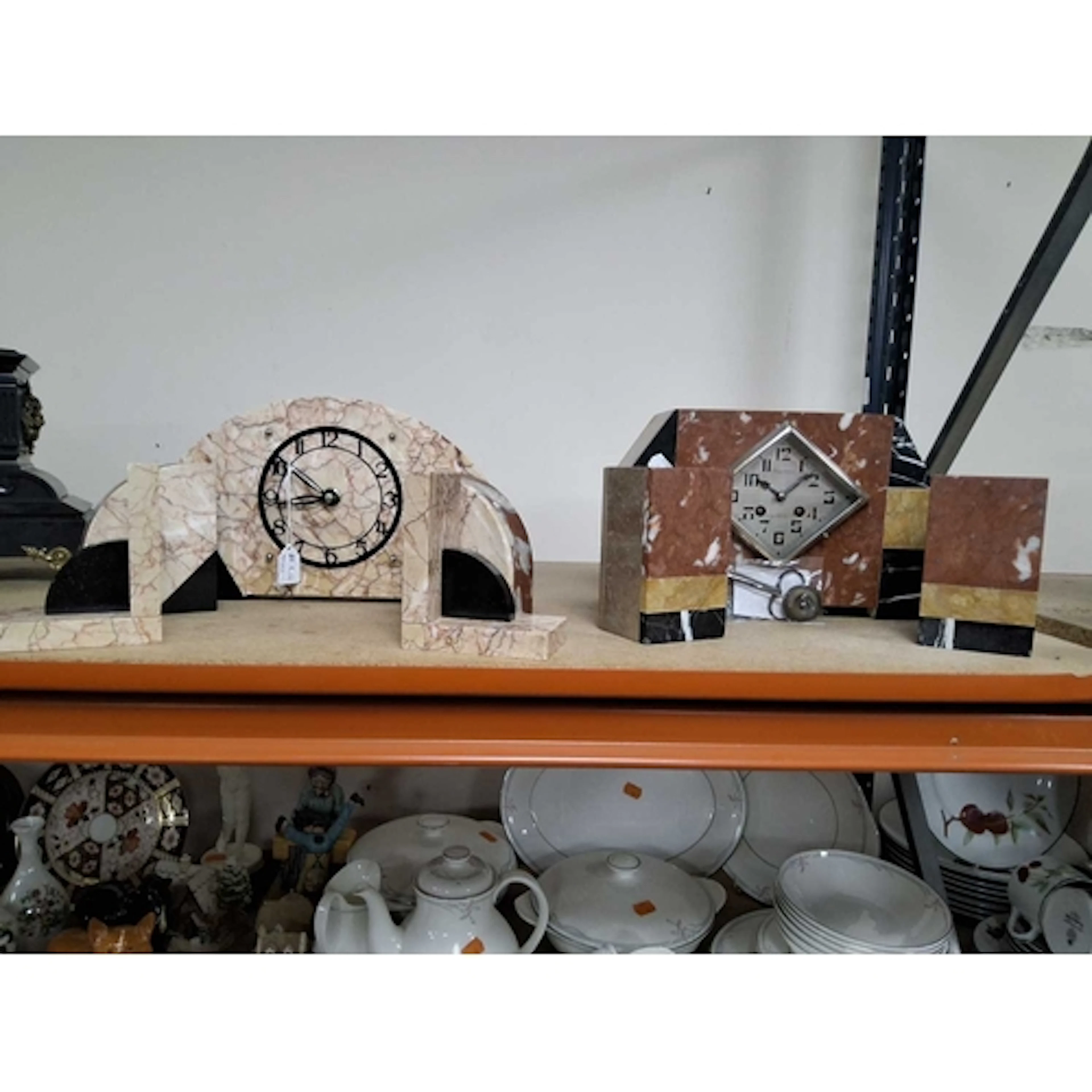 TWO ART DECO MARBLE CLOCKS, the first being a variegated mar...