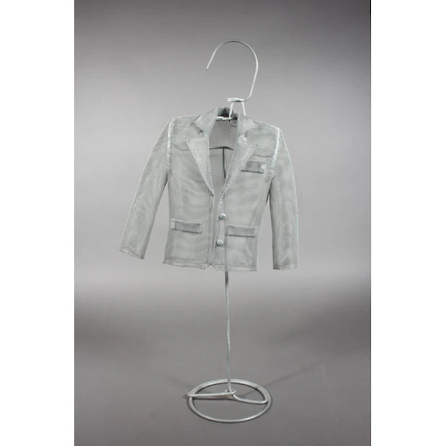 Modernist metal art sculpture in the form of a jacket on sta...