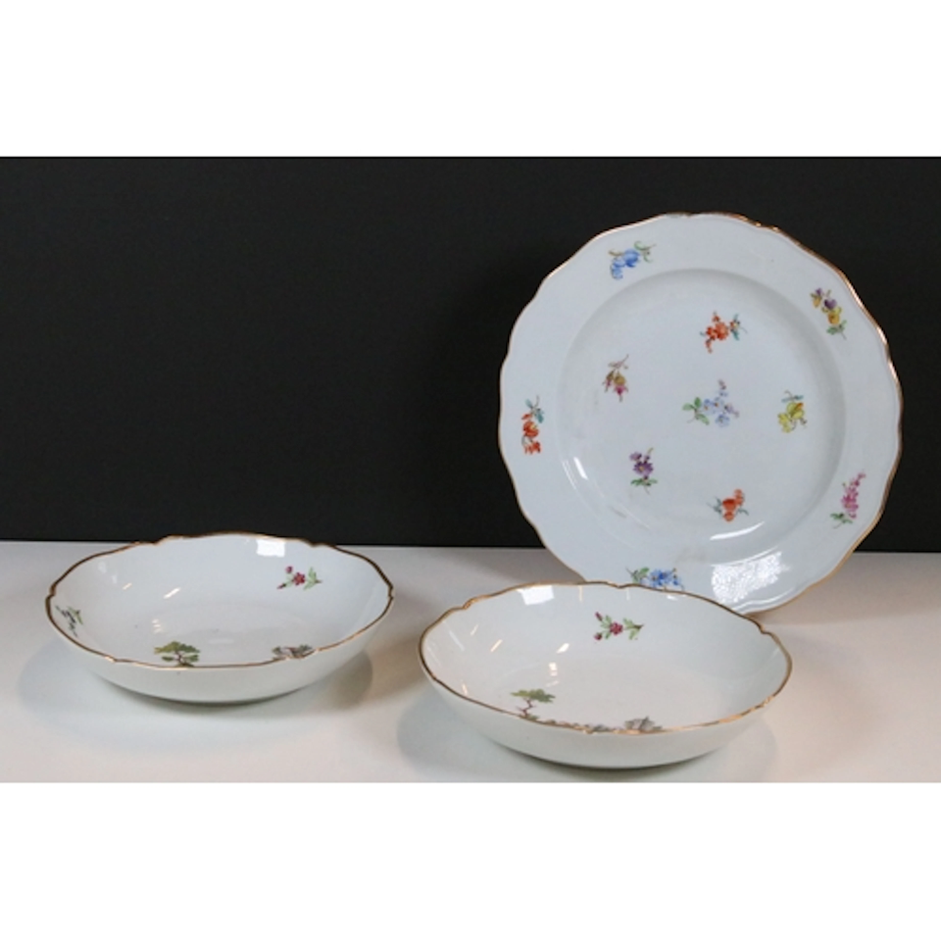 Two 19th century Continental porcelain plates, each hand-pai...