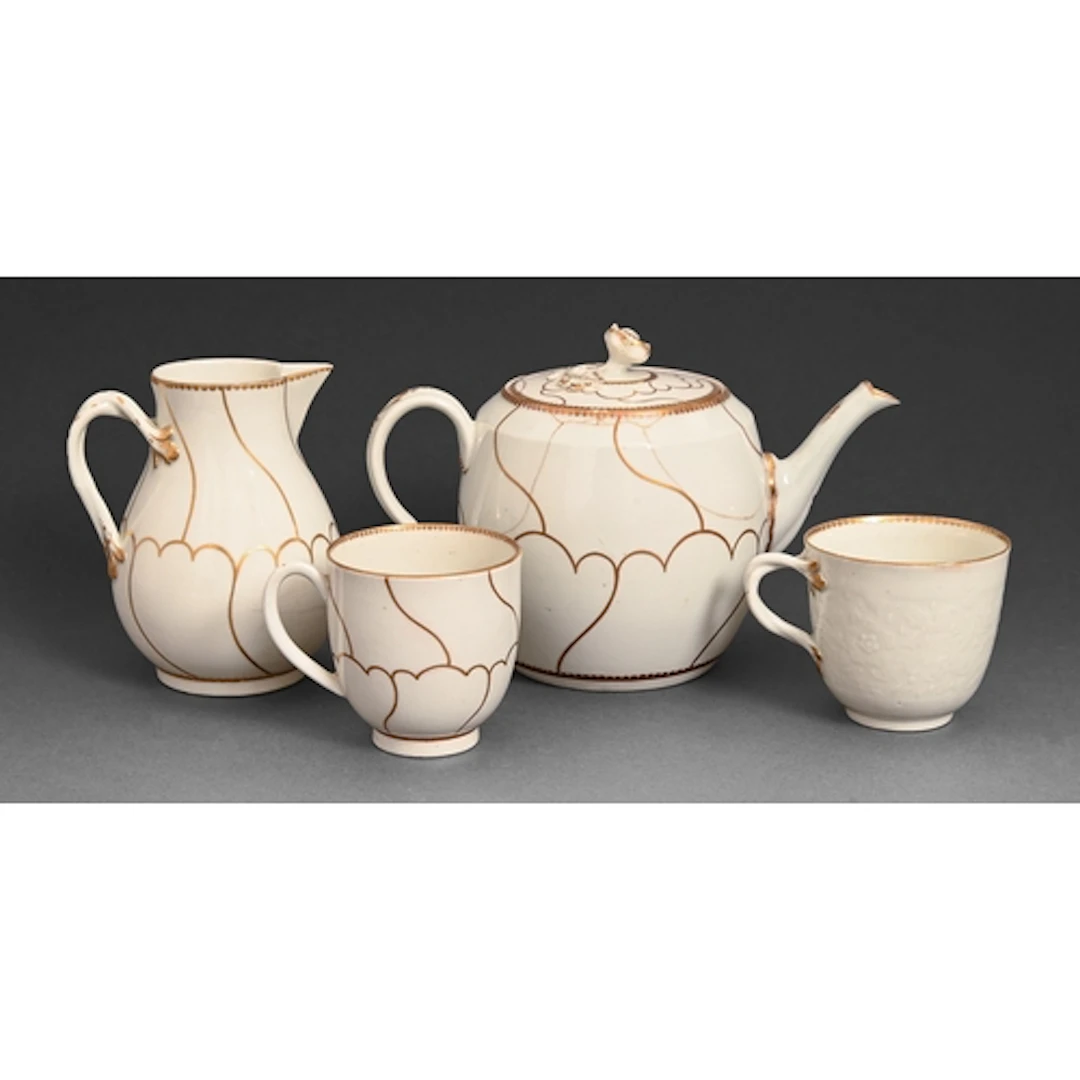 A Worcester chrysanthemum moulded coffee cup, c1770, with gi...