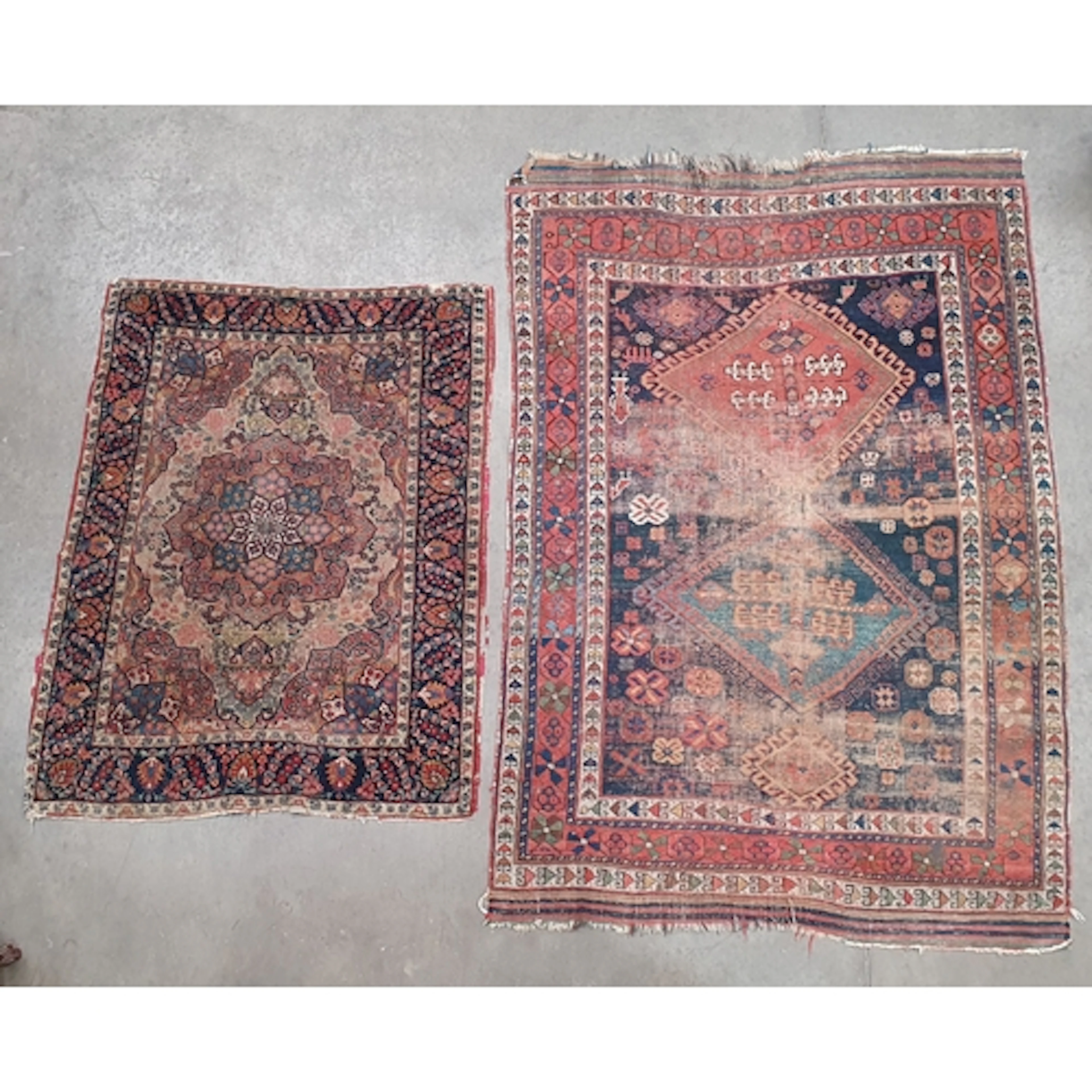 A Persian style Rug on beige ground with floral borders with...